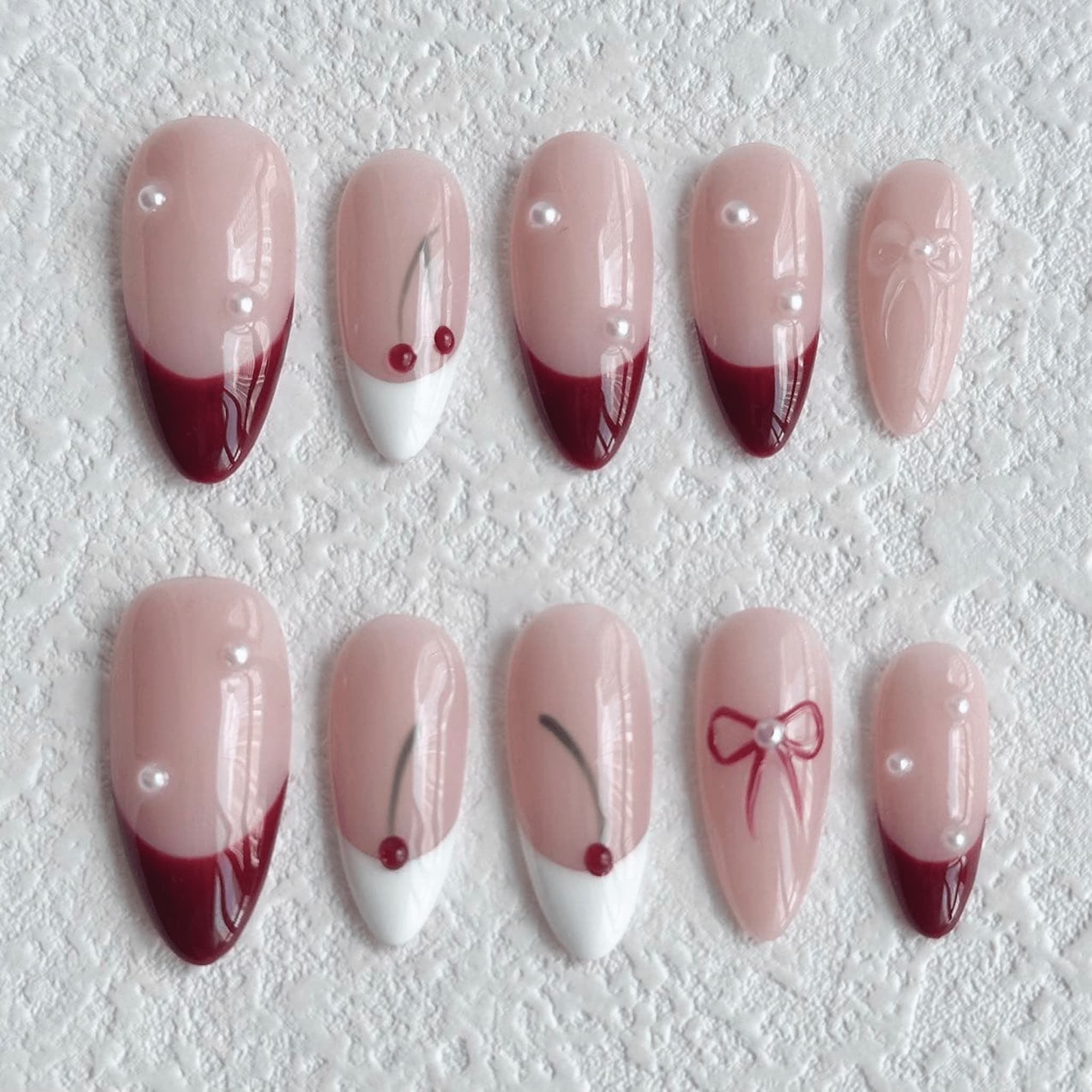 medium length dark red almond press on nails with cherry designs, cherry press on nails