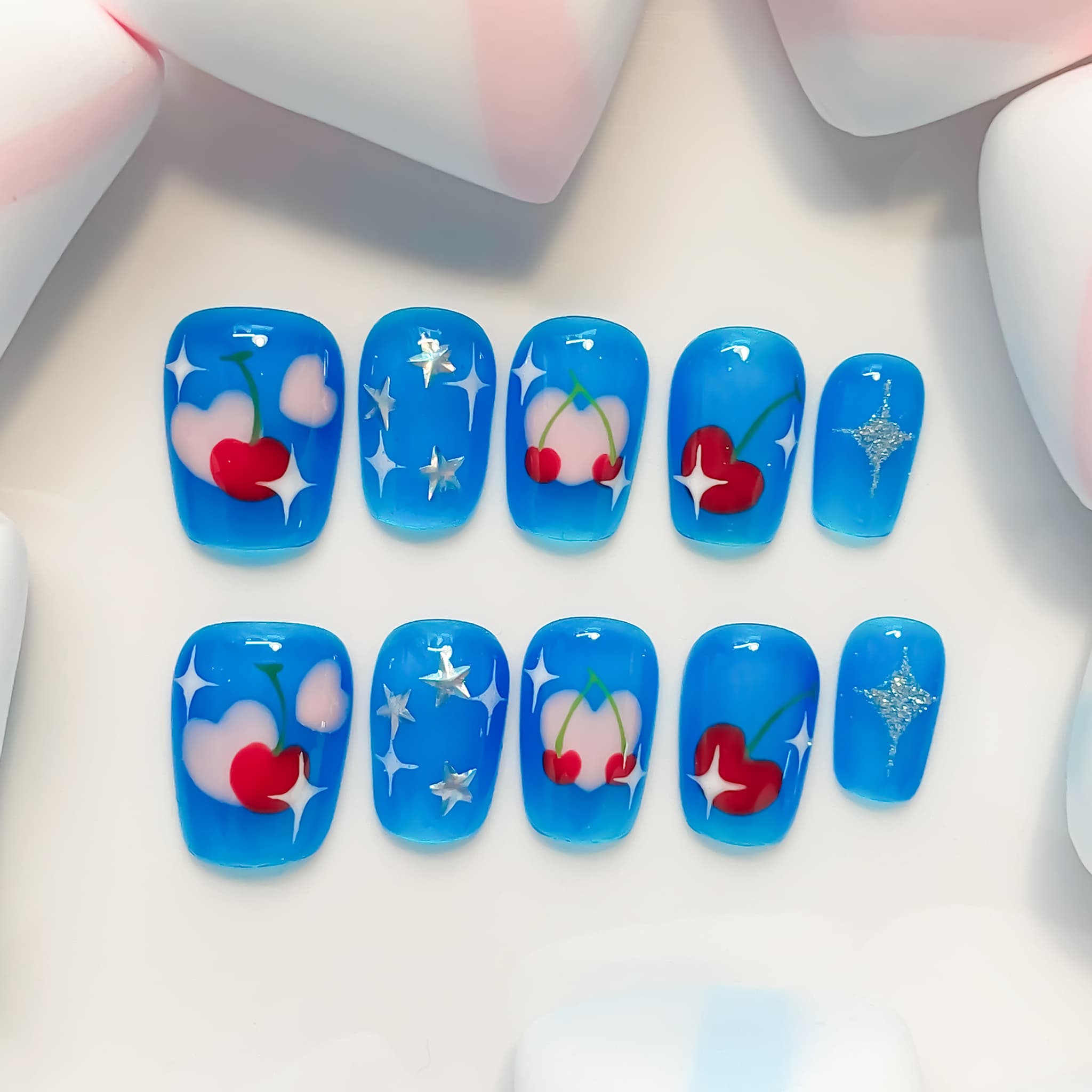 short length deep sky blue coffin press on nails with cherry and star designs