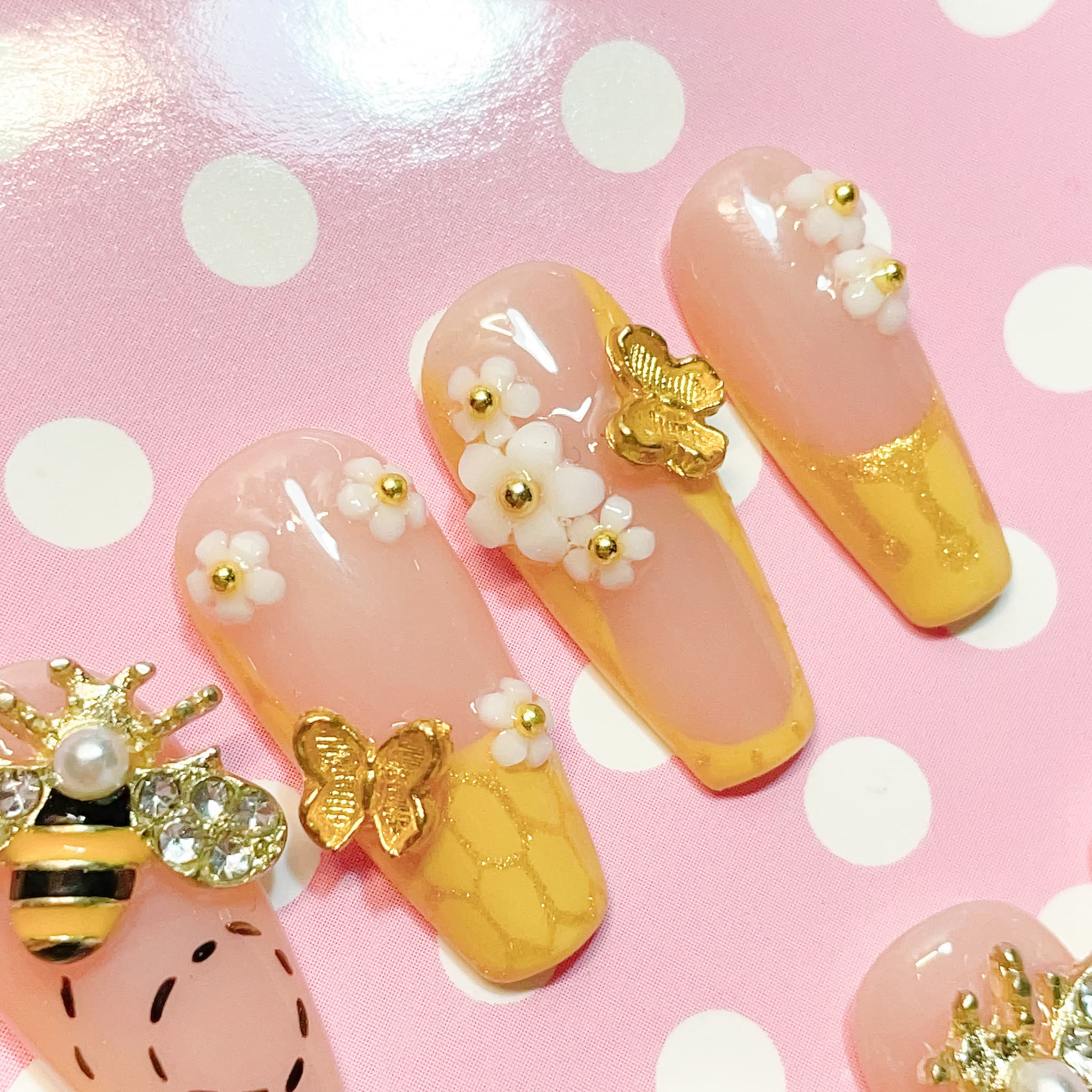 medium length gold coffin press on nails with bee design
