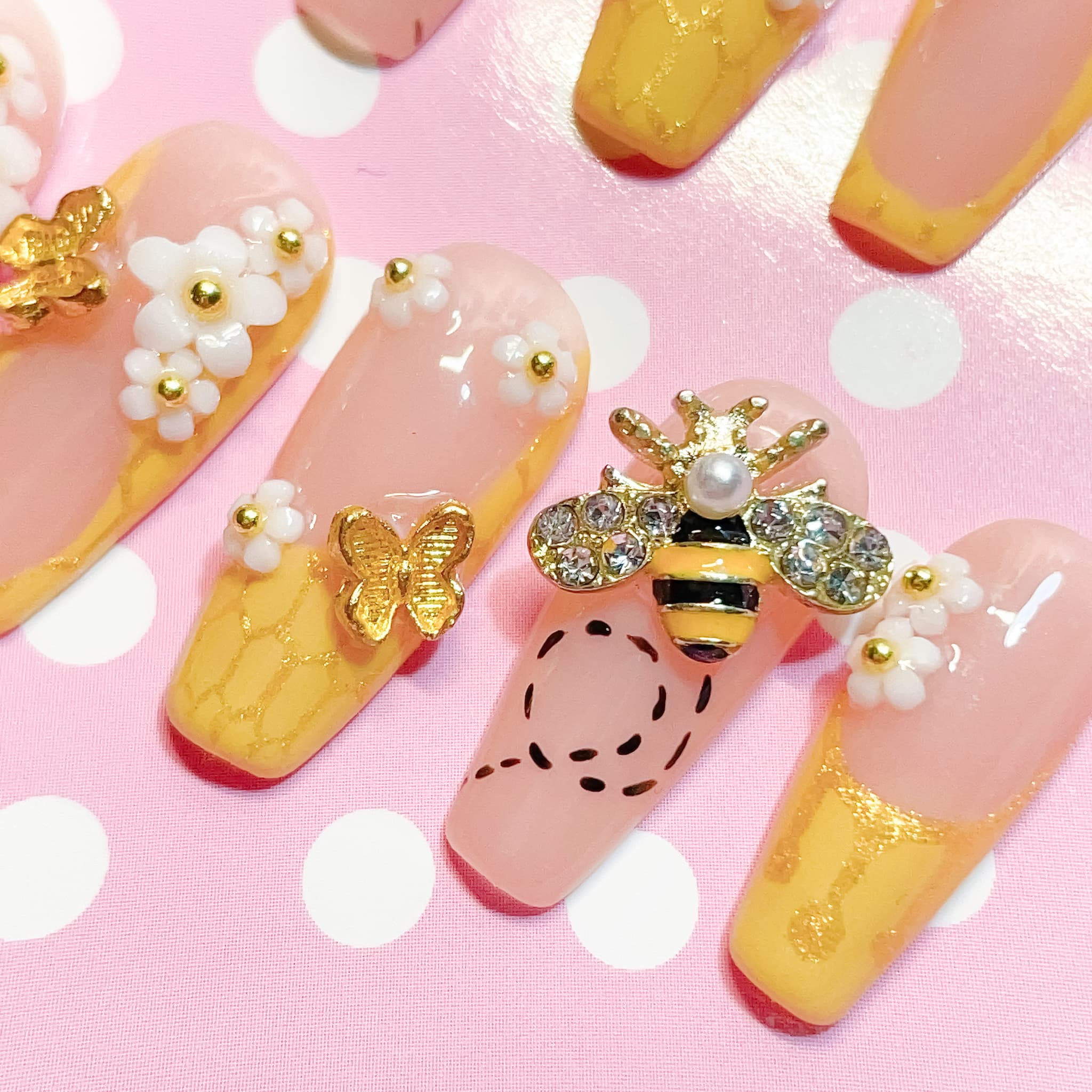 medium length gold coffin press on nails with bee design