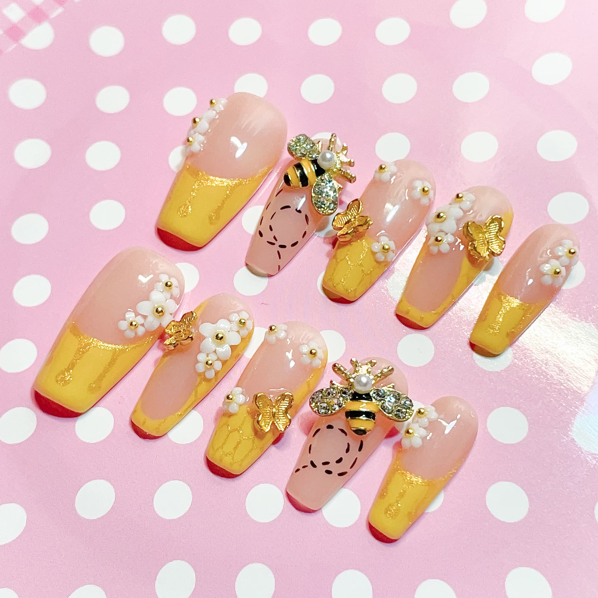 medium length gold coffin press on nails with bee design