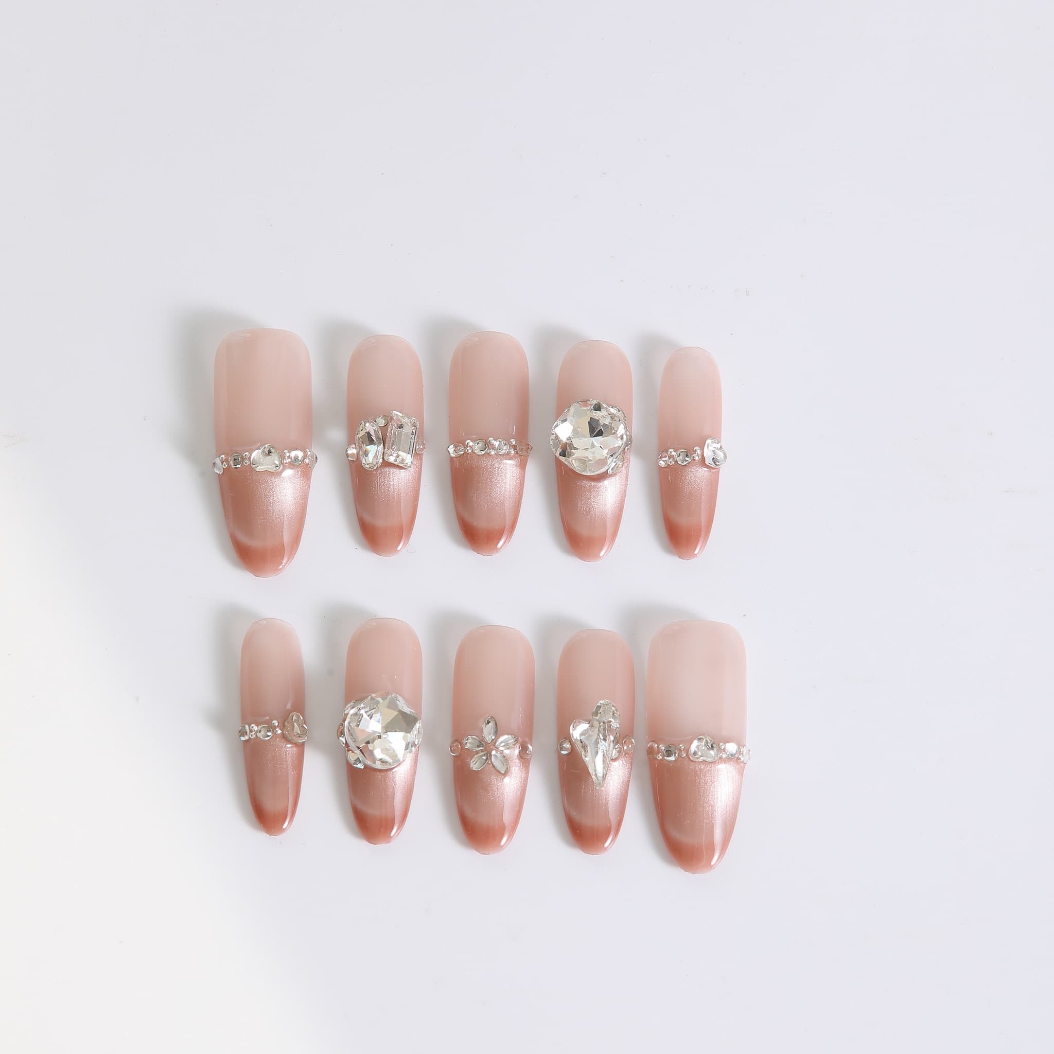 long length light coral oval press on nails with gemstones