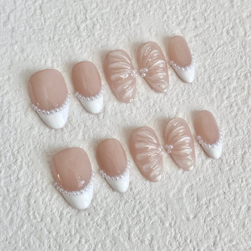 short length white almond press on nails with french tips design