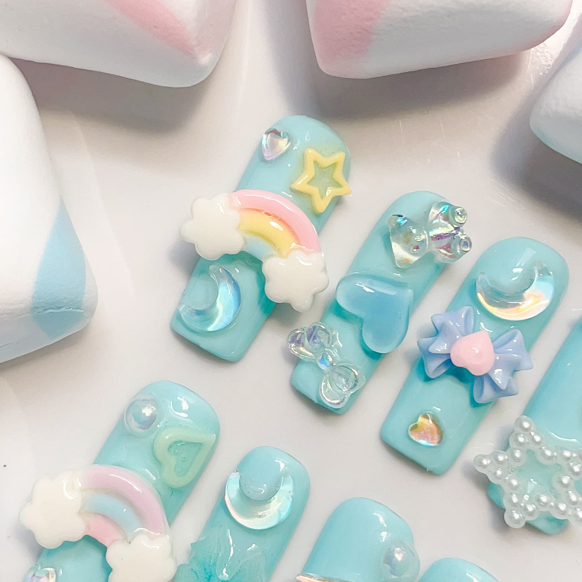 long length light pink square press on nails with star , bows , bear, heart shape and butterfly charm