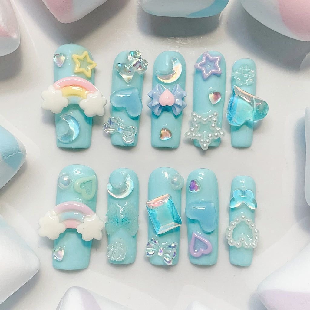 long length light blue square press on nails with star , bows , bear, heart shape and butterfly charm