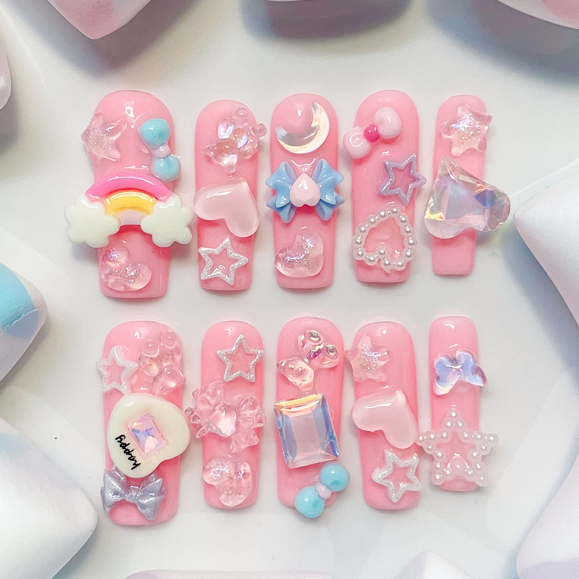 long length light pink square press on nails with star , bows , bear, heart shape and butterfly charm