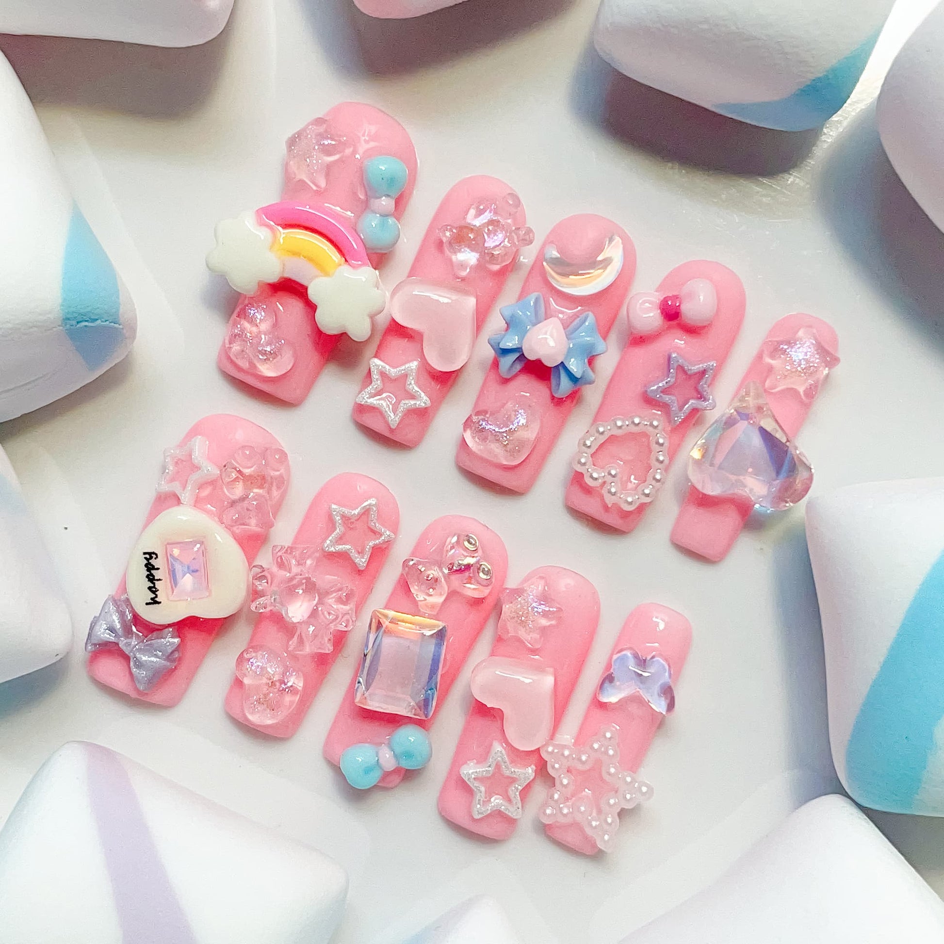 long length light pink square press on nails with star , bows , bear, heart shape and butterfly charm