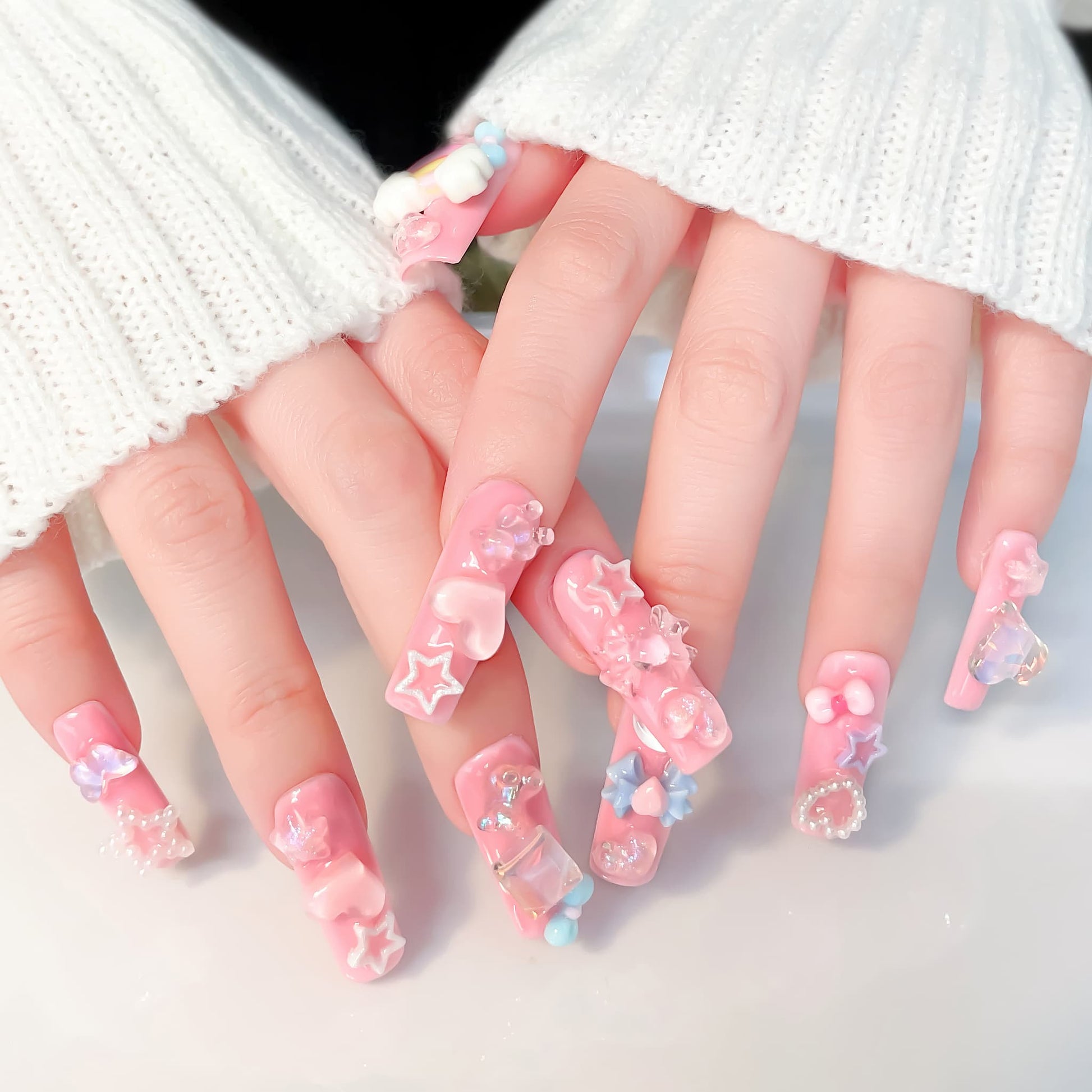 long length light pink square press on nails with star , bows , bear, heart shape and butterfly charm