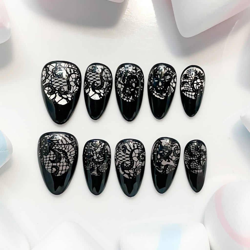 short length black almond press on nails with lace design