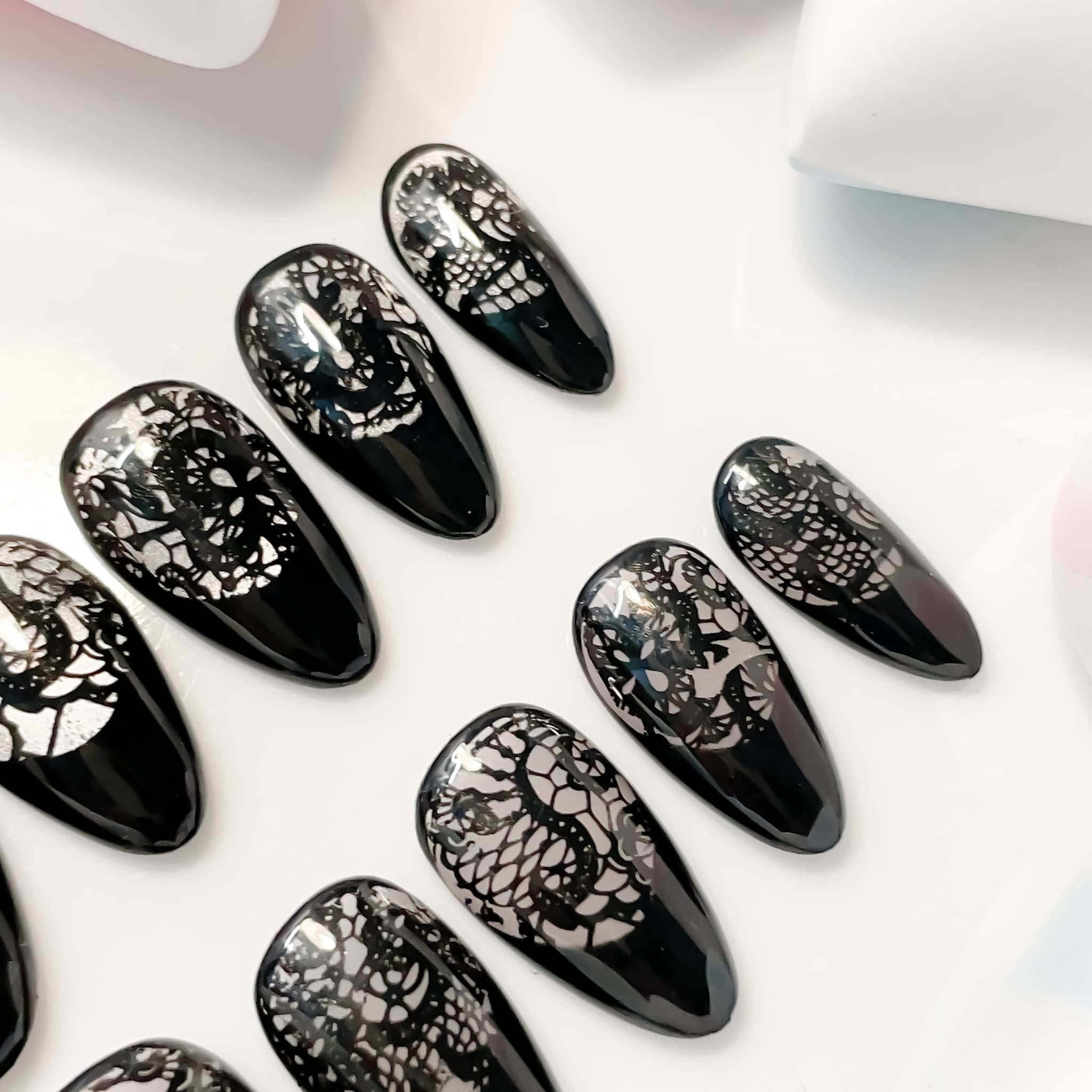 short length black almond press on nails with lace design
