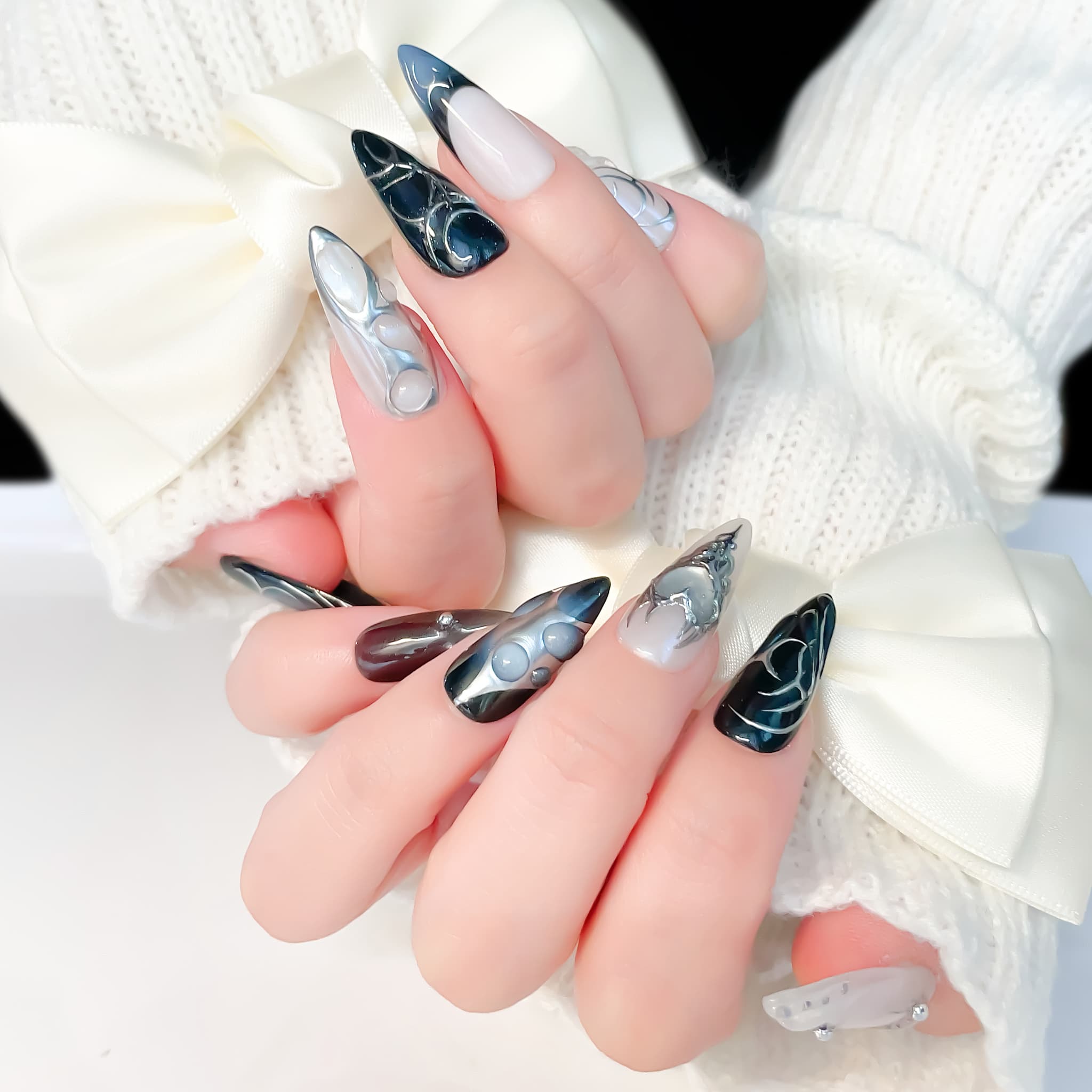 medium length black stiletto with metallic design