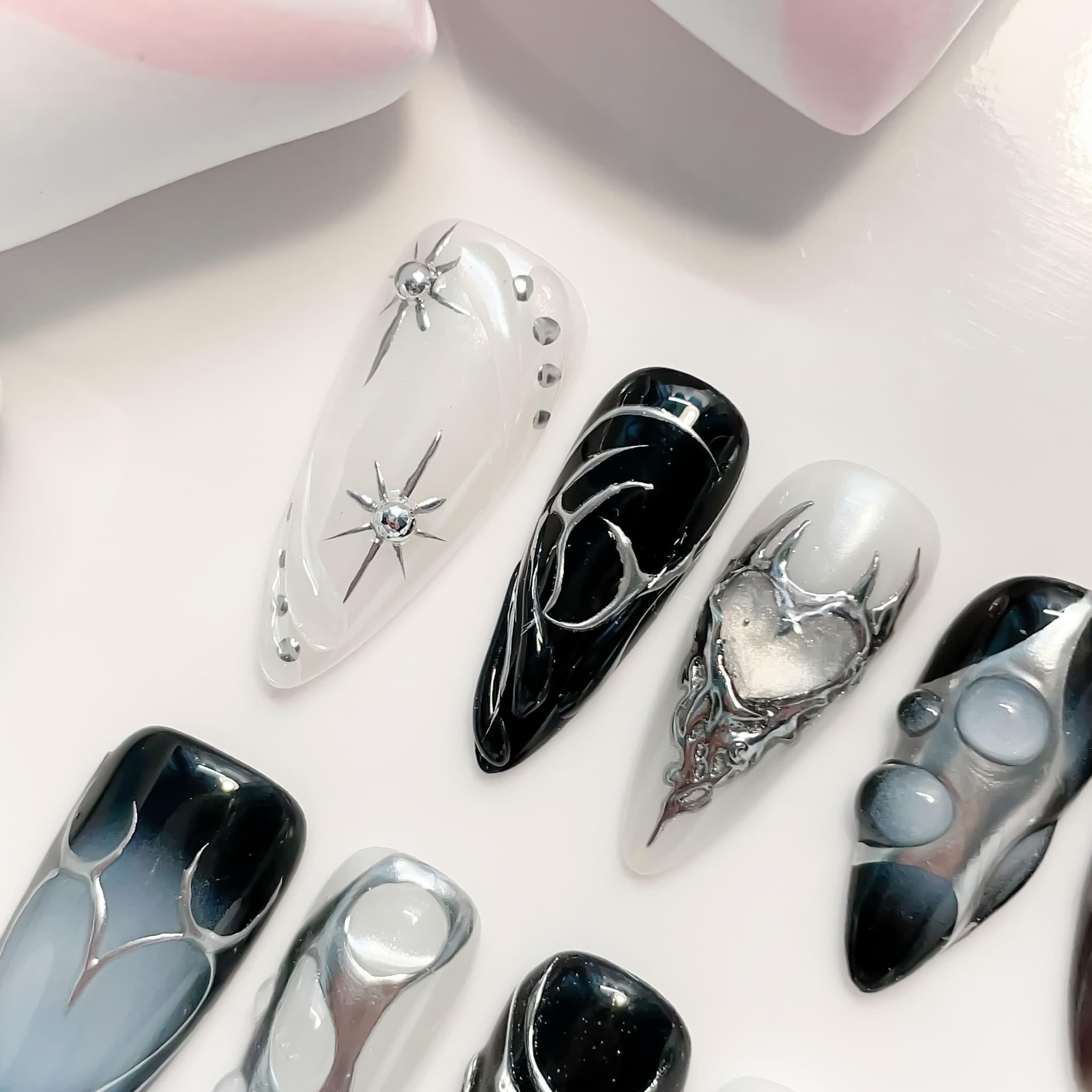 medium length black stiletto with metallic design