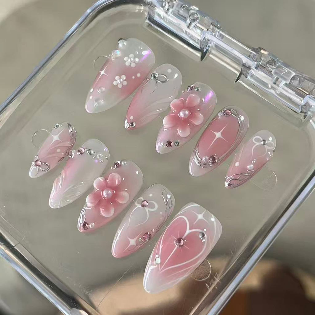 elegant pink glossy medium almond press on nails with pink blush and 3d flowers and heart motifs