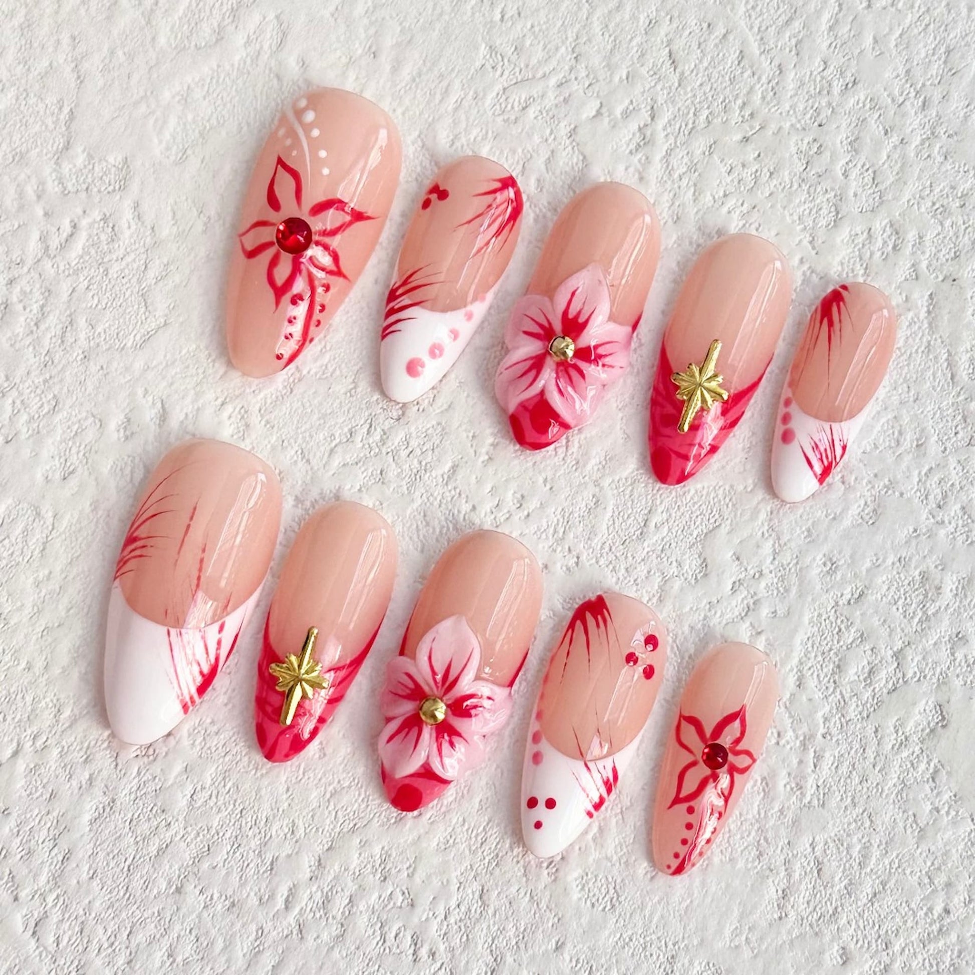 medium length red almond press on nails with 3d flower designs