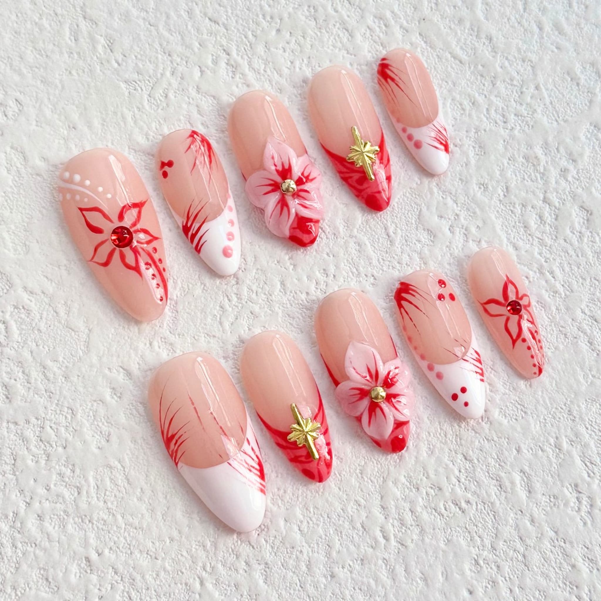 medium length red almond press on nails with 3d flower designs