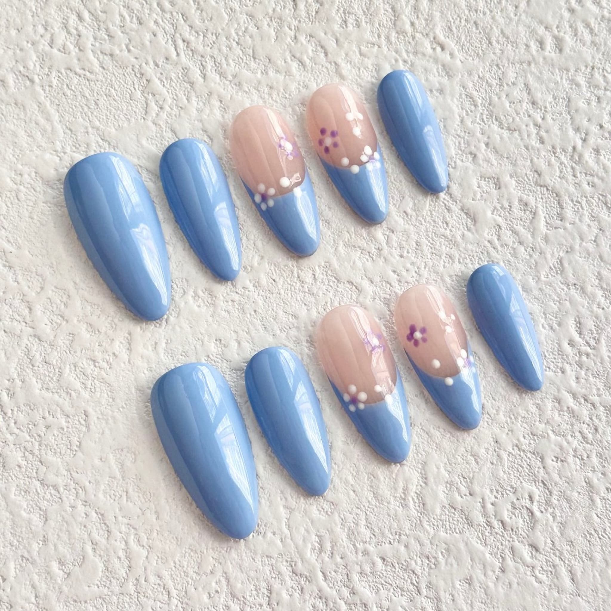 medium length light sky blue almond press on nails with aster design