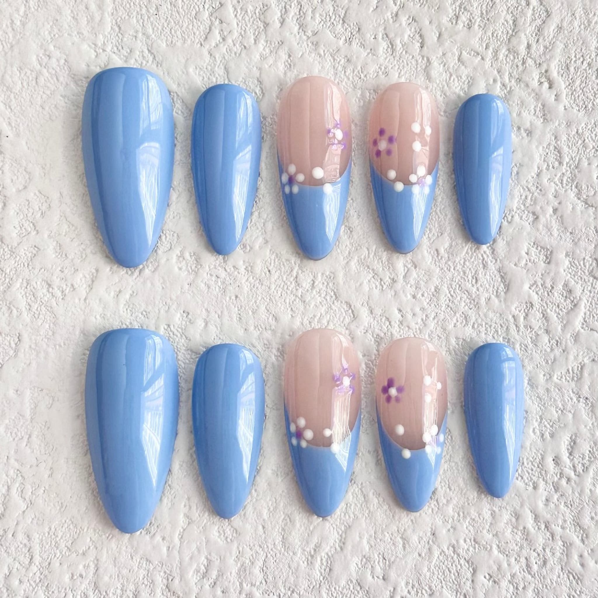 medium length light sky blue almond press on nails with aster design