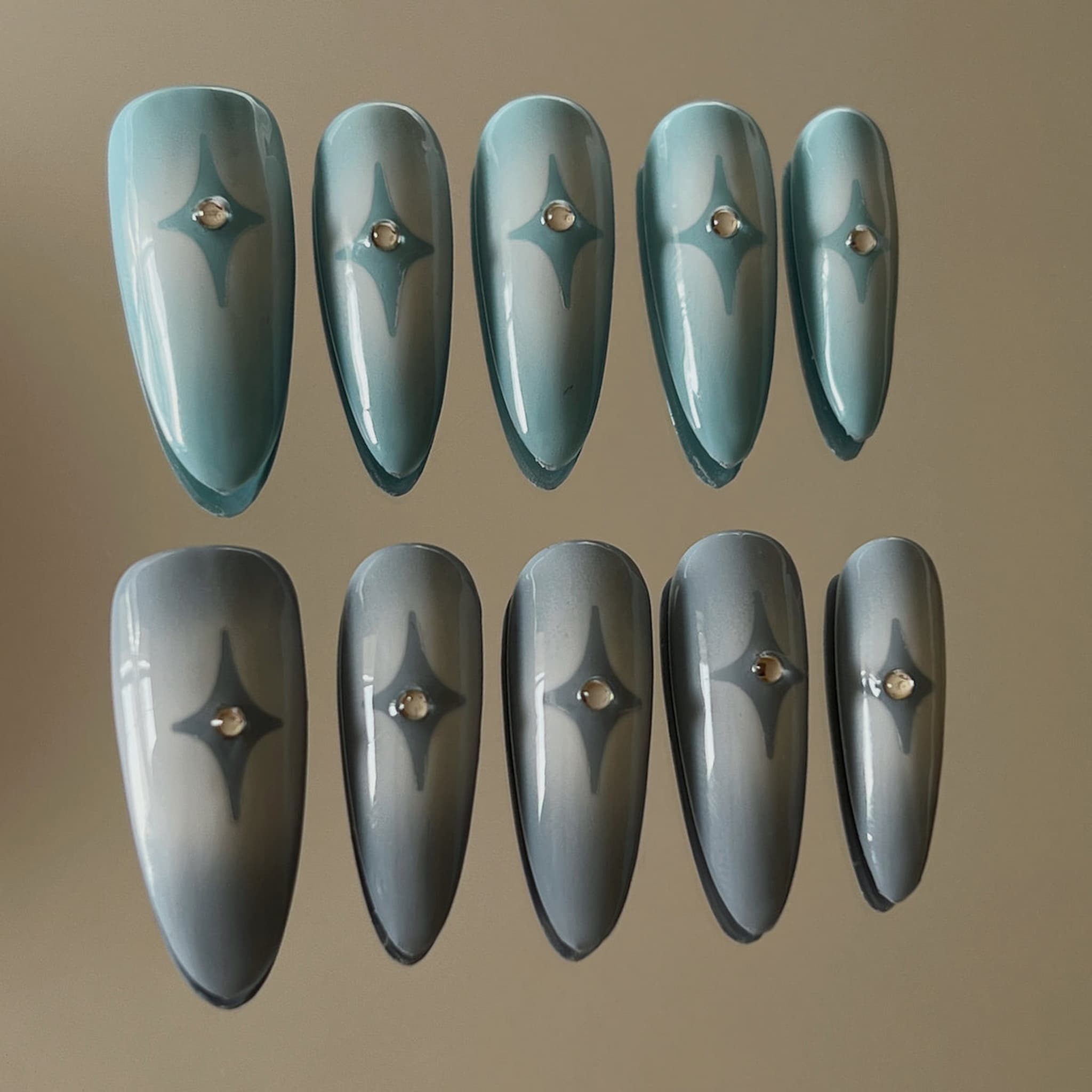 long length powder blue stiletto press on-nails with star symbol