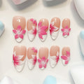 medium length pink almond press on nails with craved flowers design
