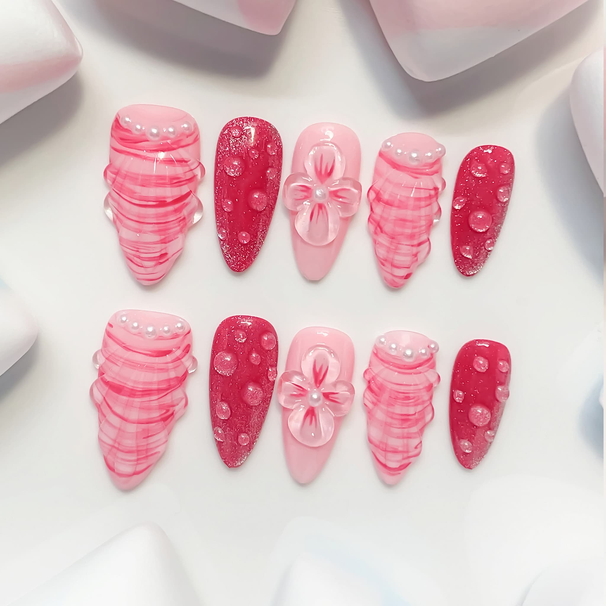 medium length hot pink almond press on nails with seashell designs