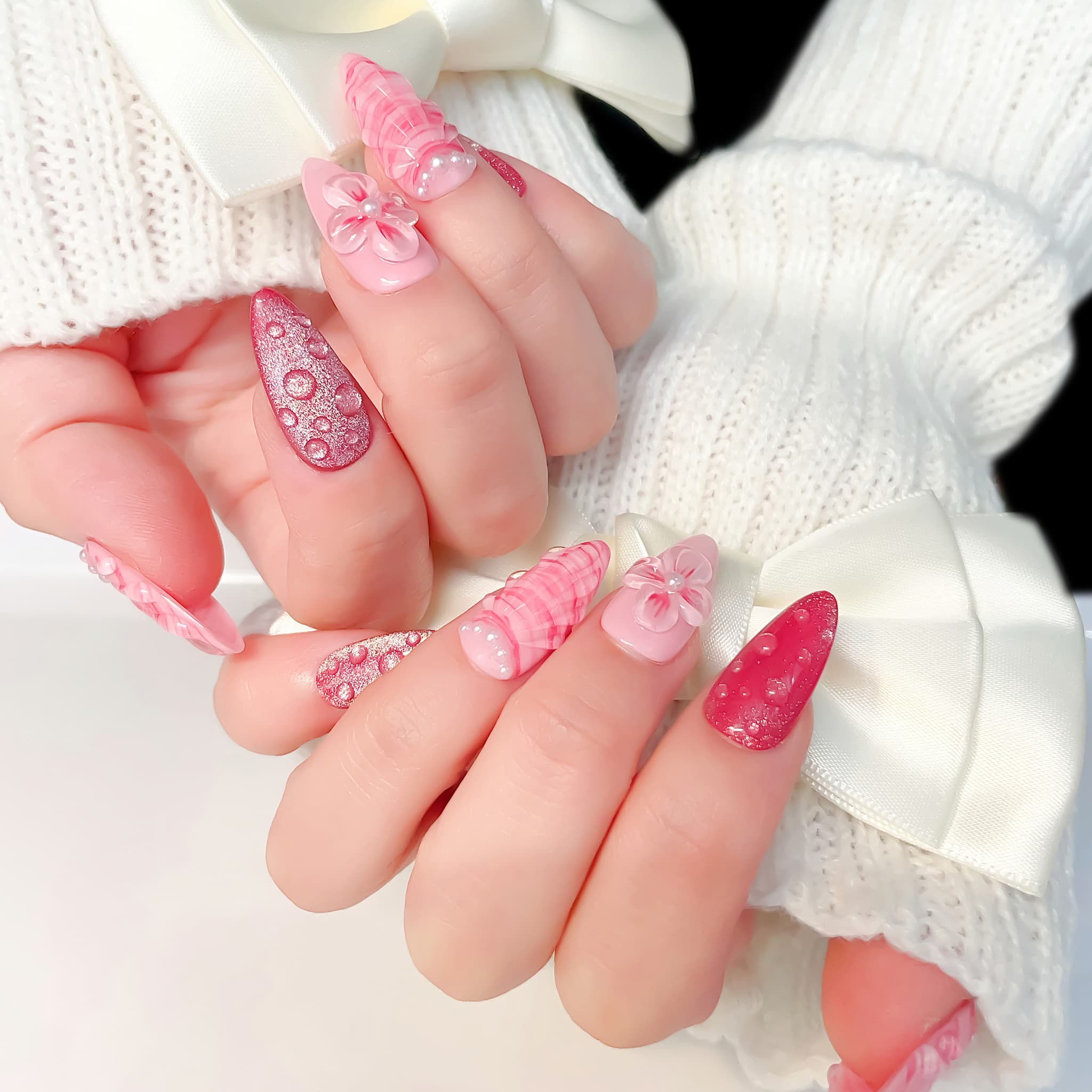 medium length hot pink almond press on nails with seashell designs