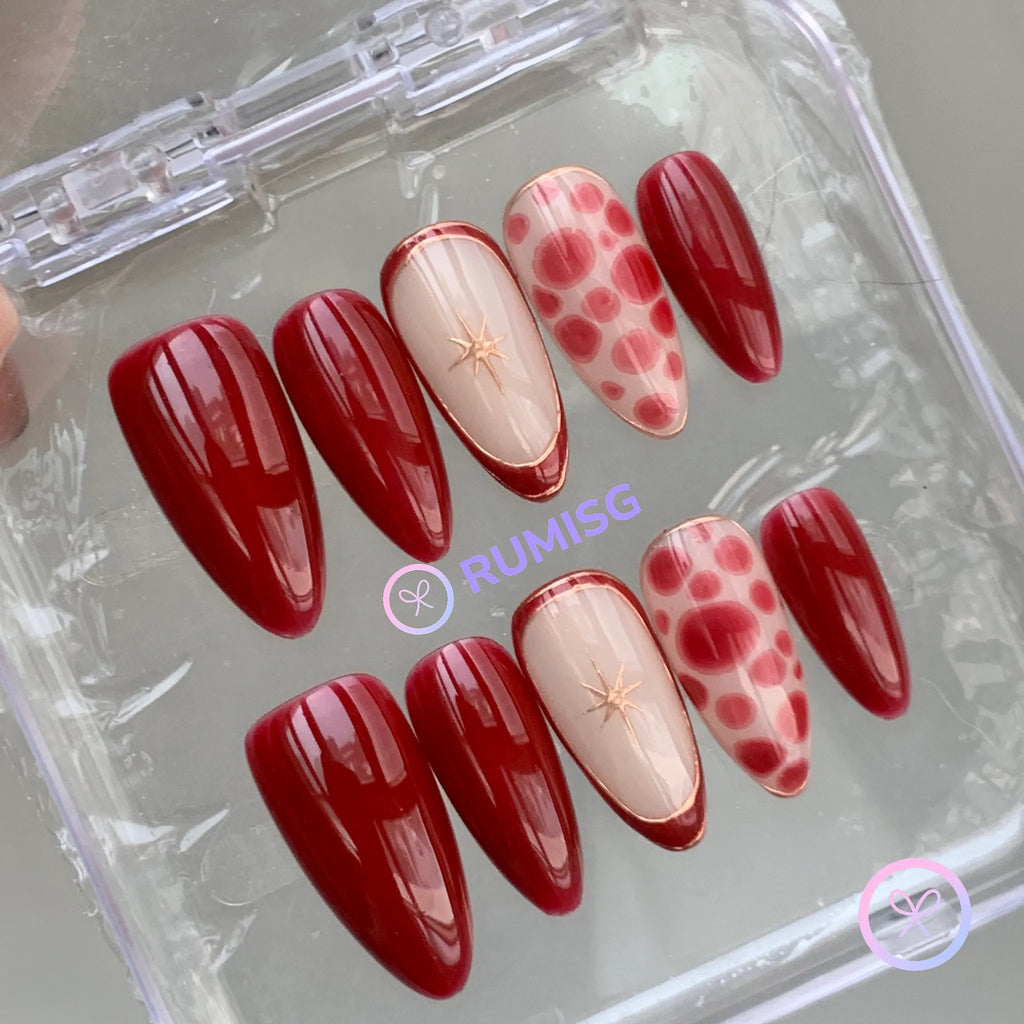 elegant red glossy short almond press on nails with marble and gold contour