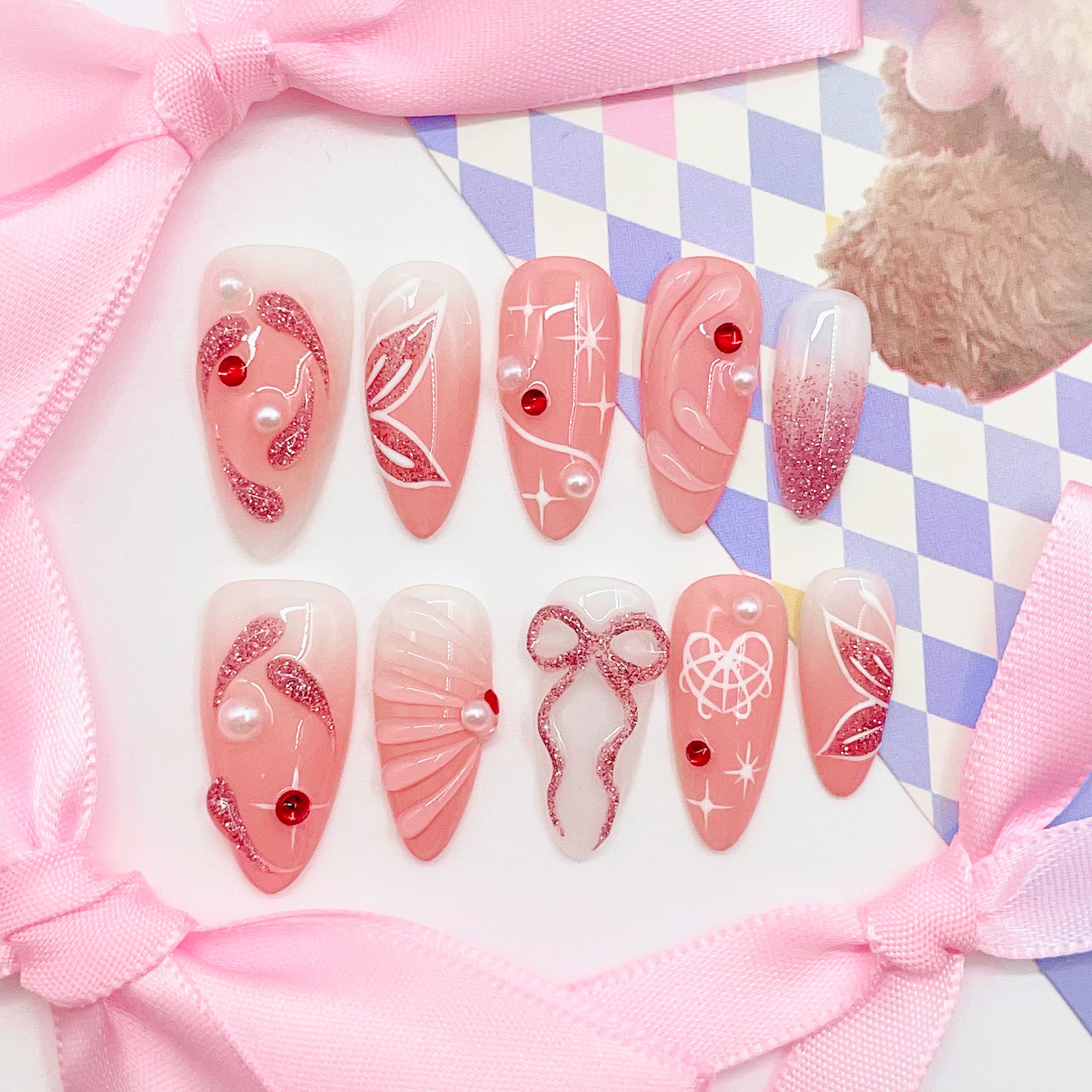 medium length light pink press on nails with butterfly design