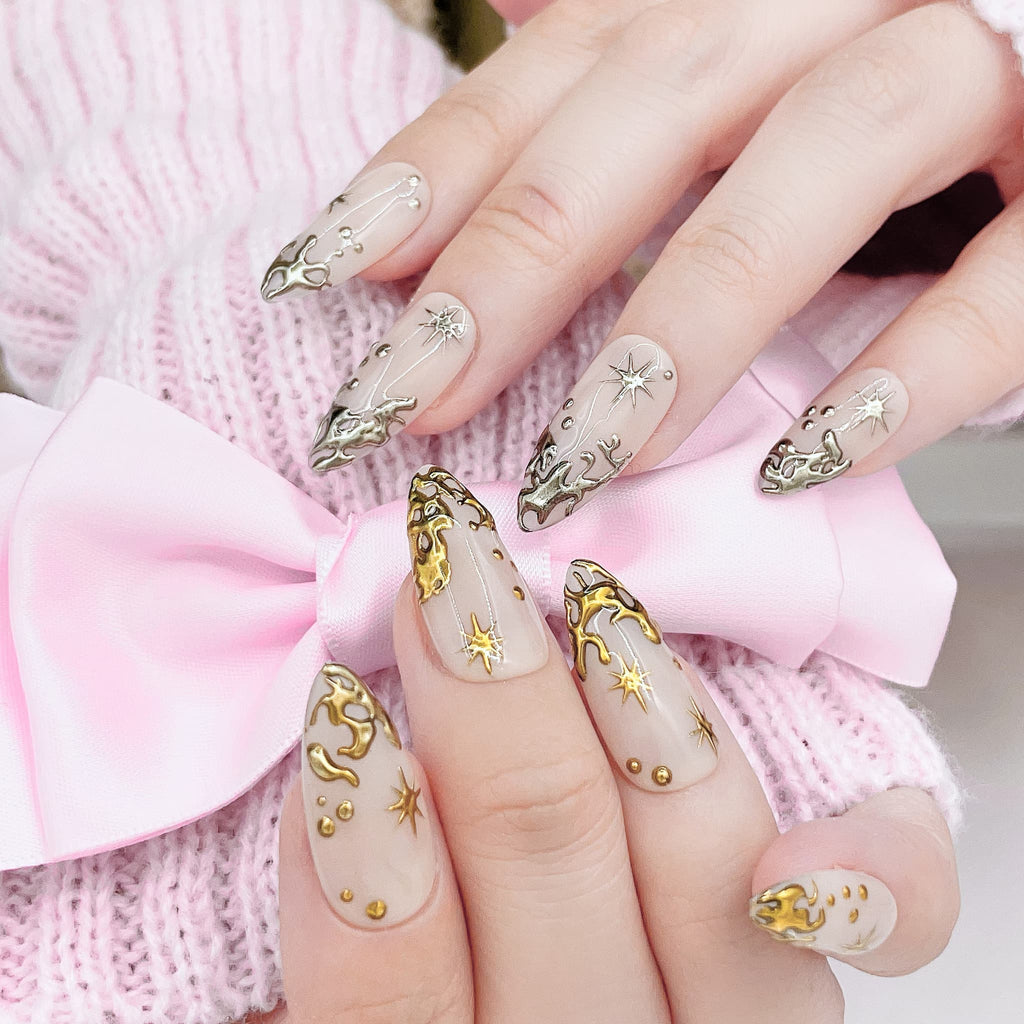 Set of beige nail art designs with gold  decorations