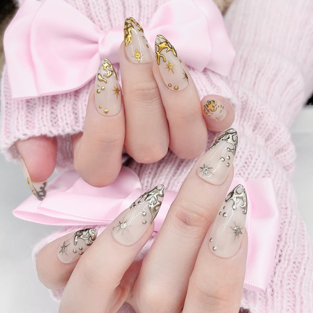 Set of beige nail art designs with gold  decorations