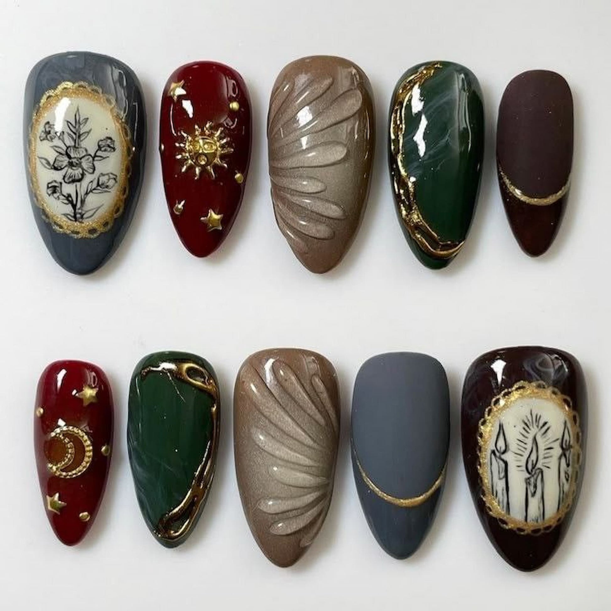 medium length almond press on nails with sun and cresent moon design
