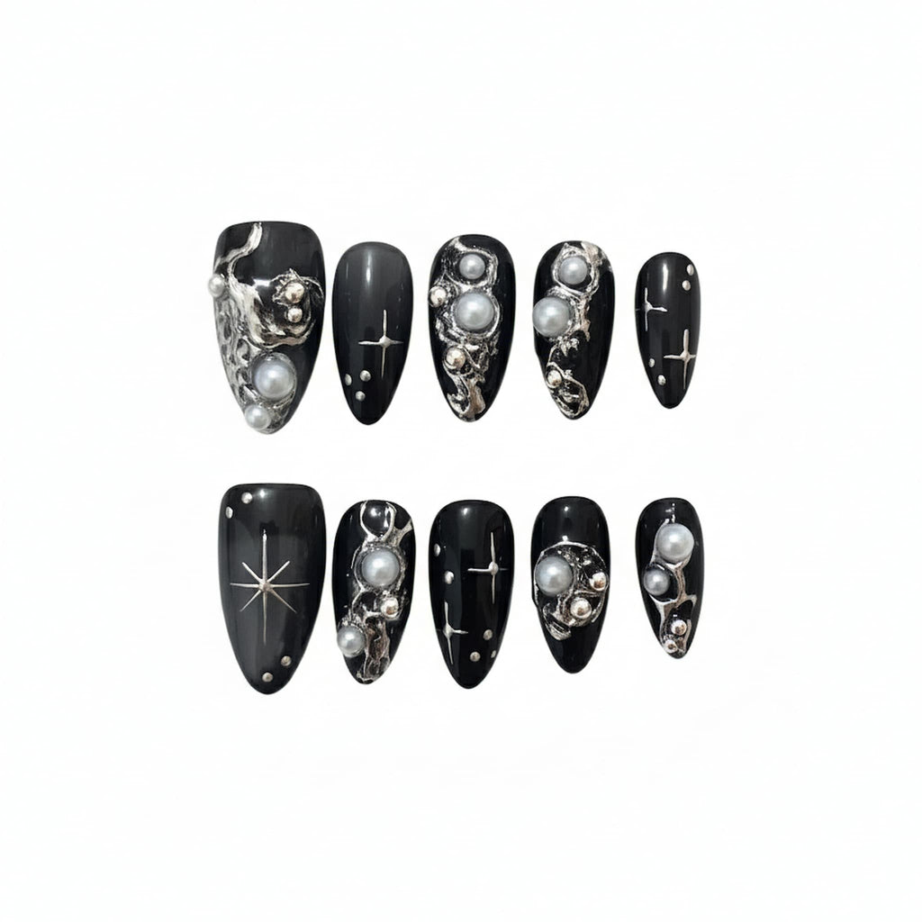 celestial black glossy medium almond press on nails with celestial design and pearls