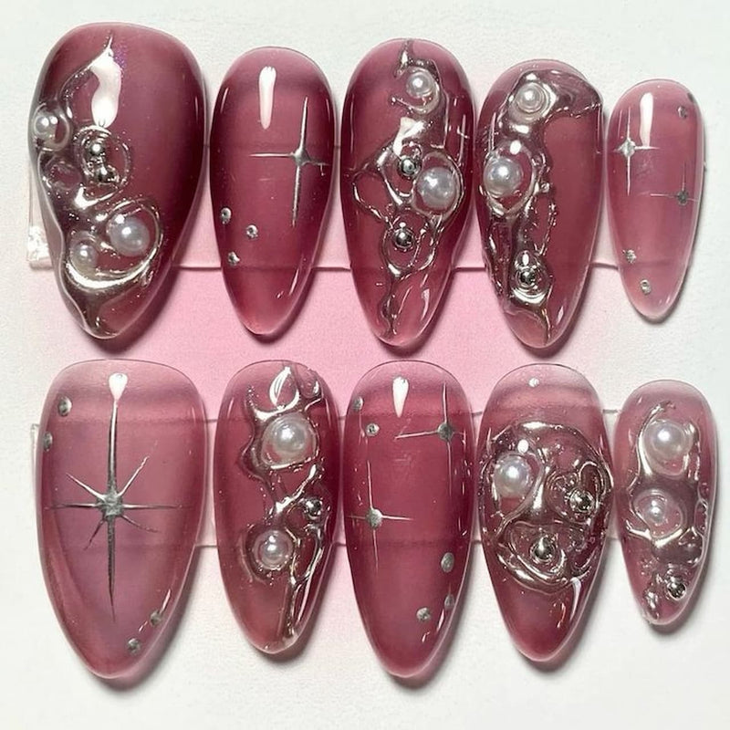 medium length pale violet red almond press on nails with metallic design
