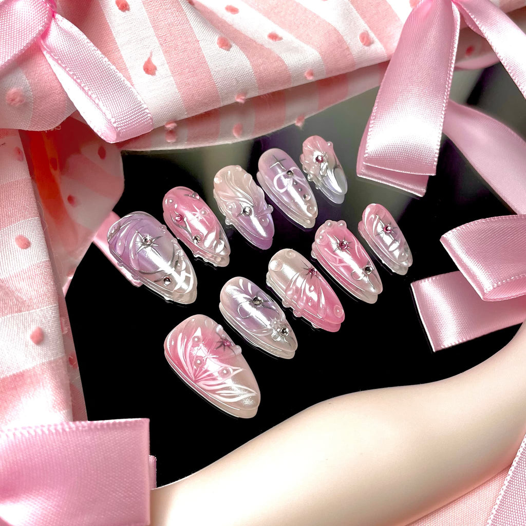 medium length thistle almond press on nails with elegant design and wings