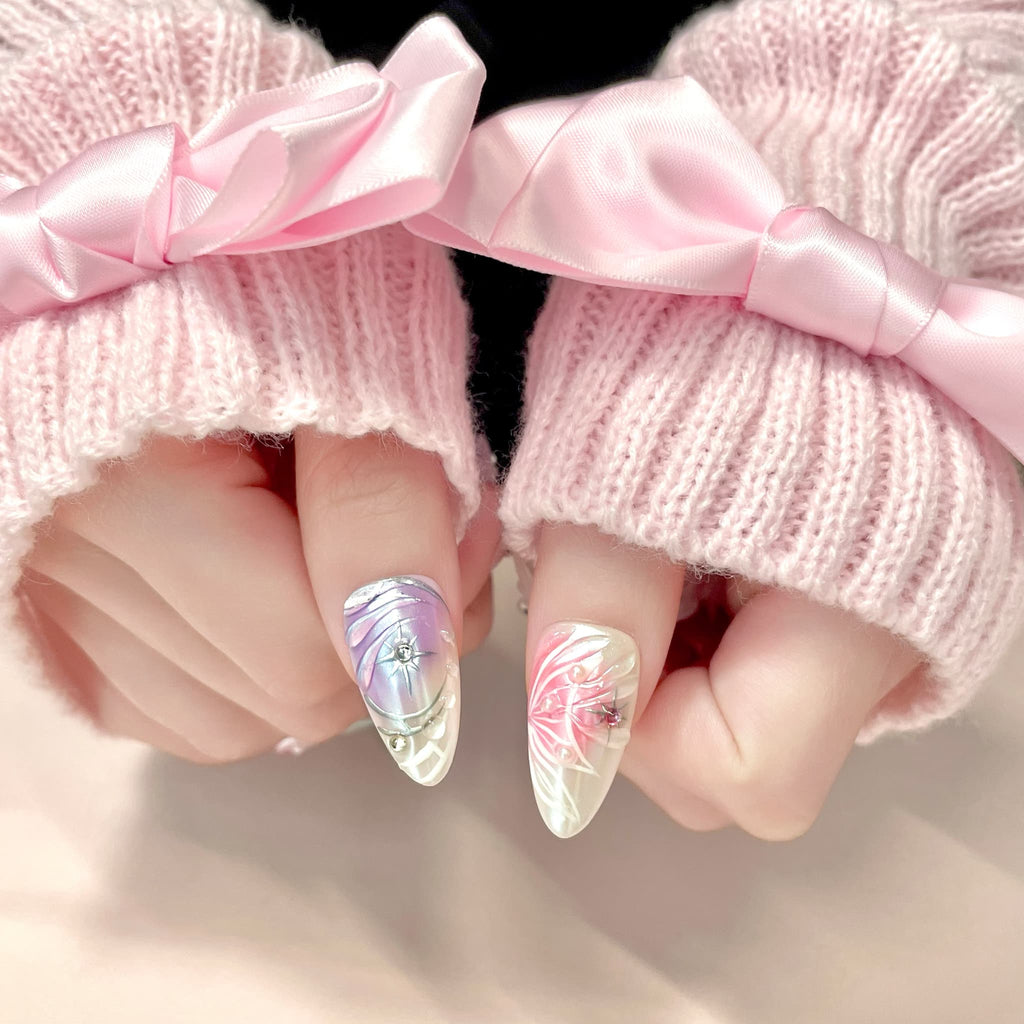 medium length thistle almond press on nails with elegant design and wings