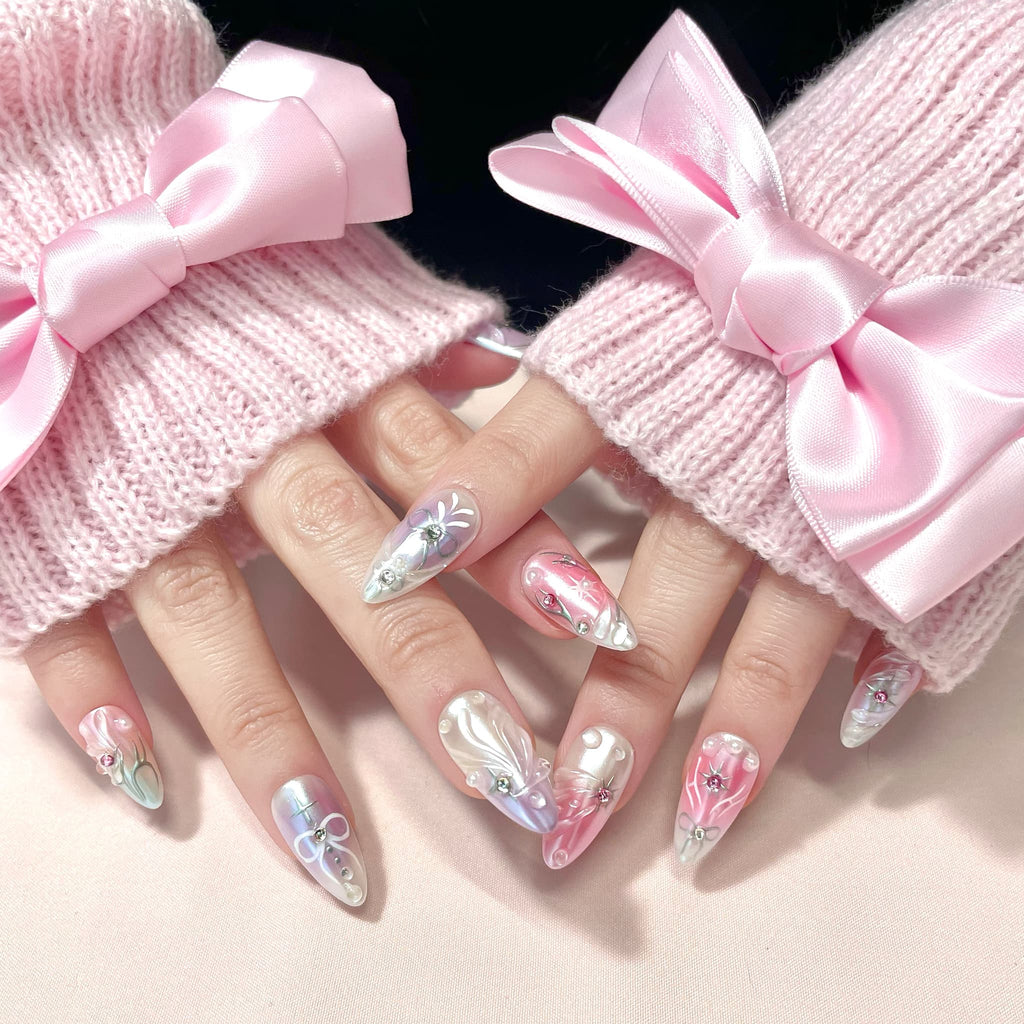 medium length thistle almond press on nails with elegant design and wings