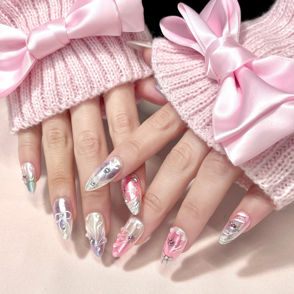 medium length thistle almond press on nails with elegant design and wings