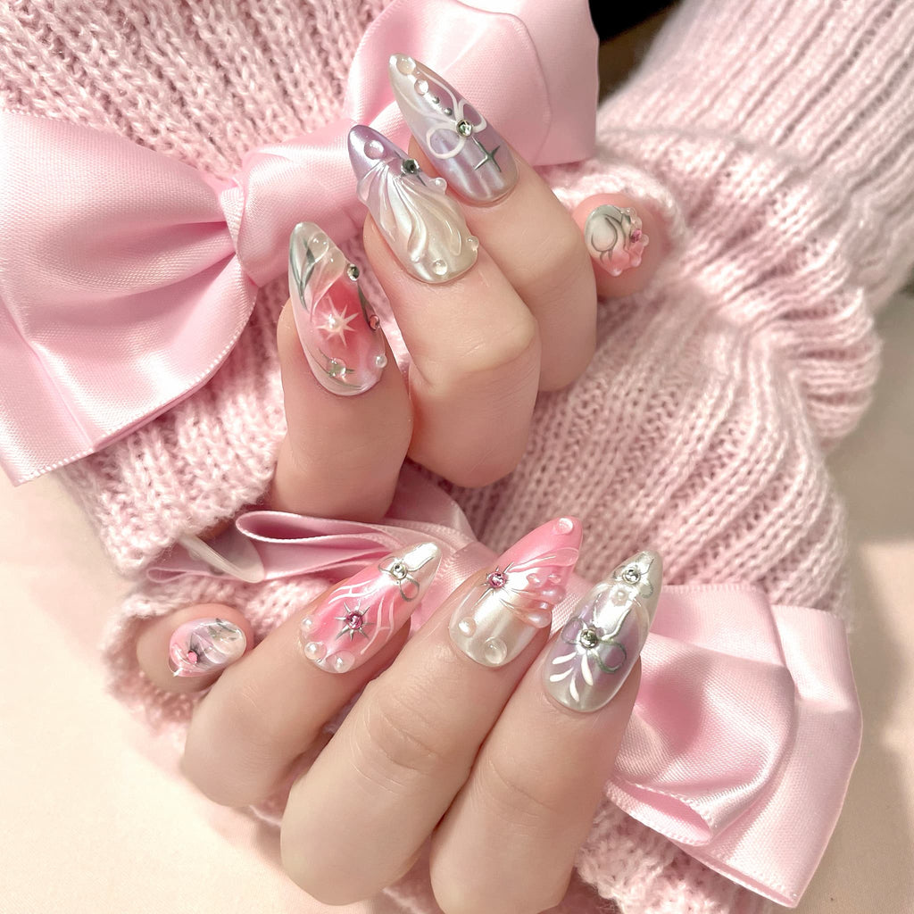 medium length thistle almond press on nails with elegant design and wings