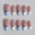 medium length white almond press on nails with french tips design and cherry with a plaid motifs