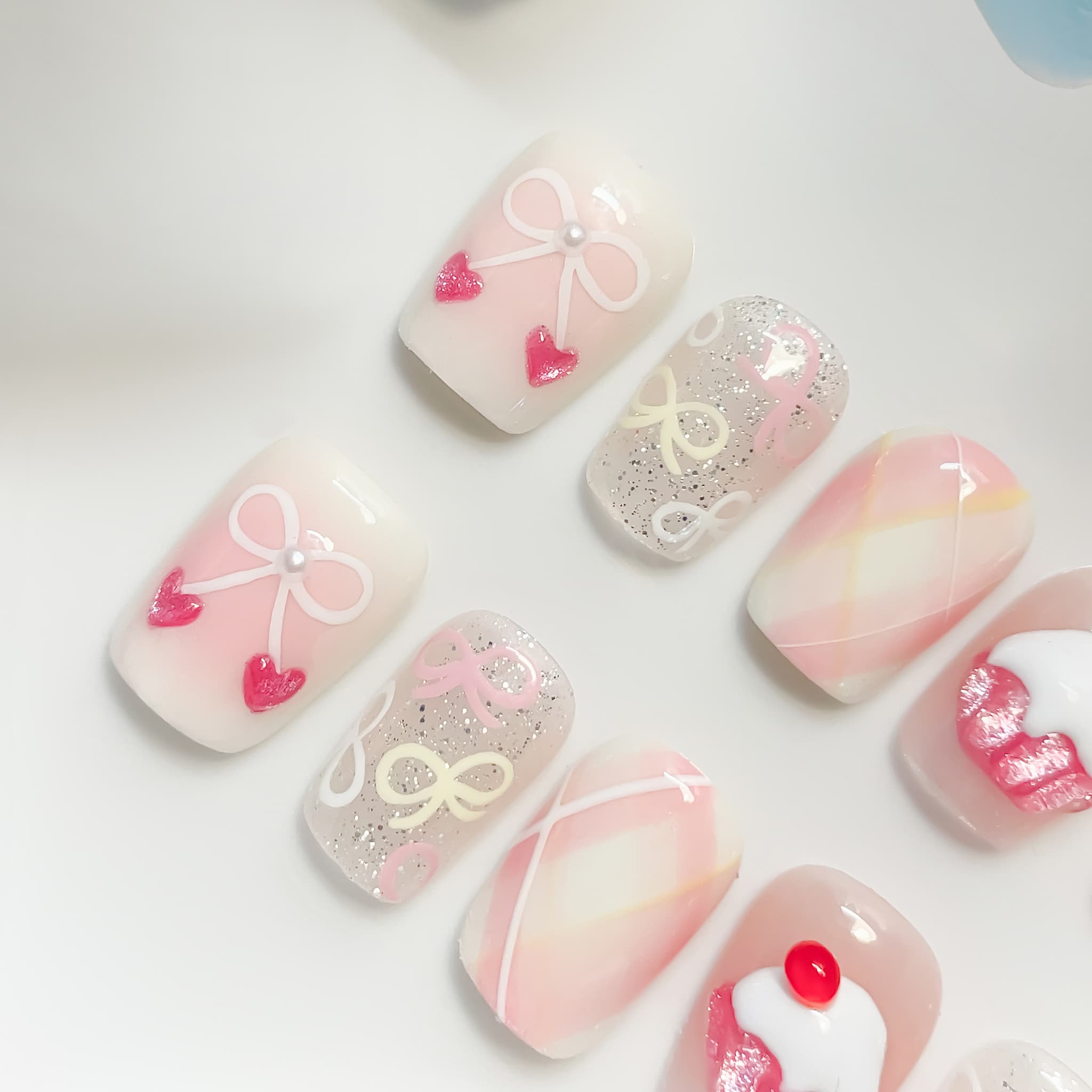 short length light pink coffin press on nails with cupcake and cherries 
