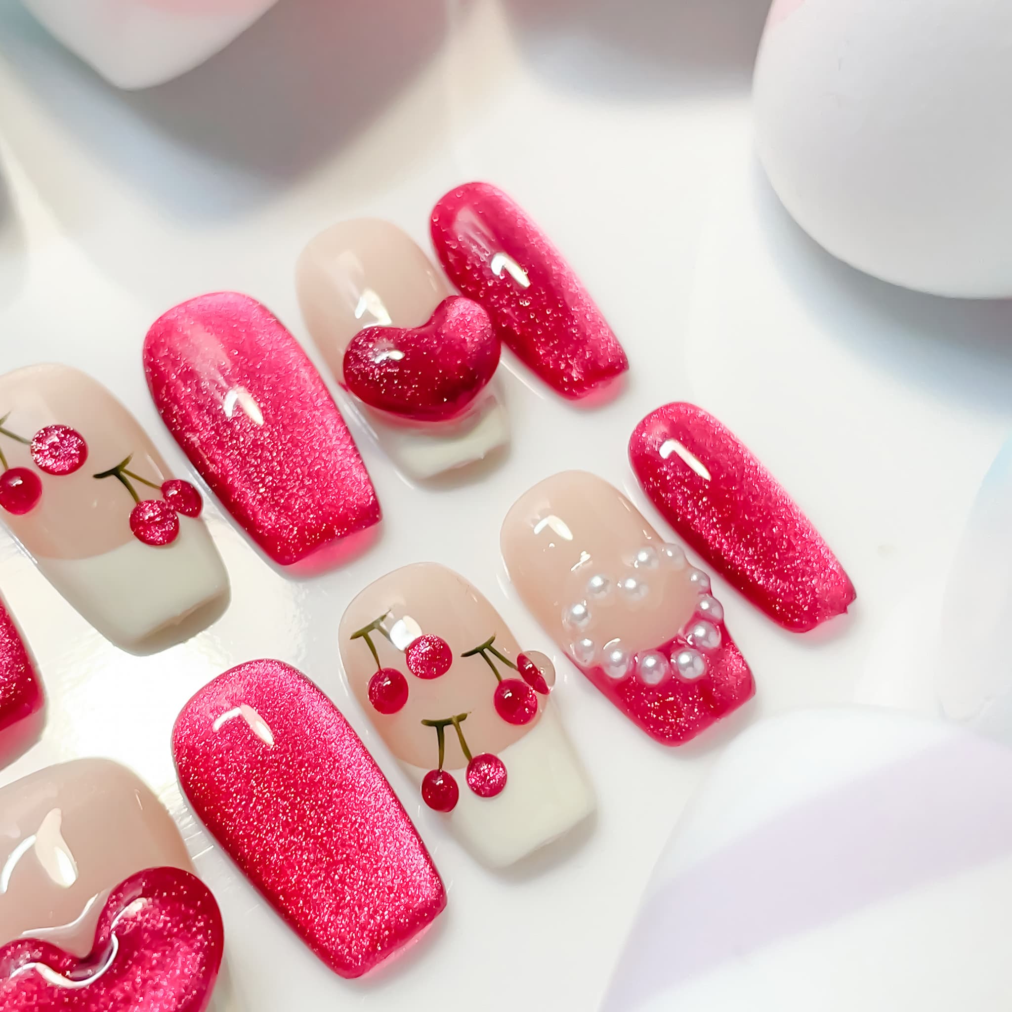short length deep pink coffin press on nails with cherry and pearls design