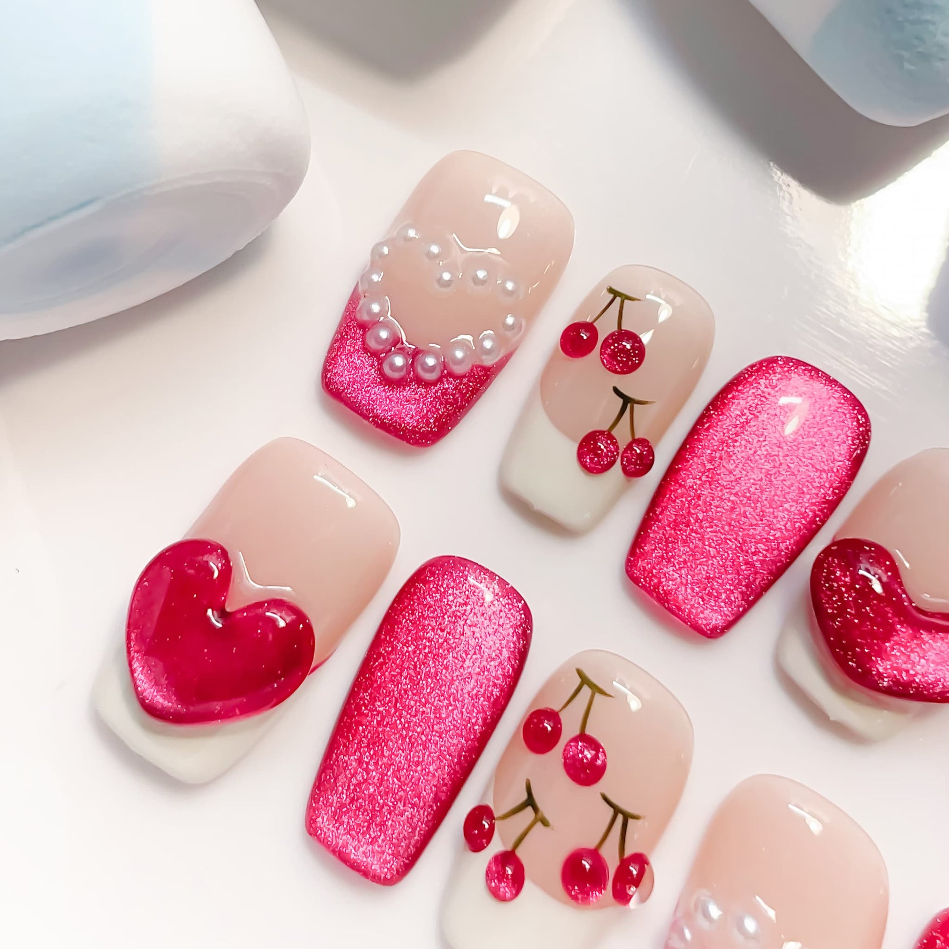 short length deep pink coffin press on nails with cherry and pearls design