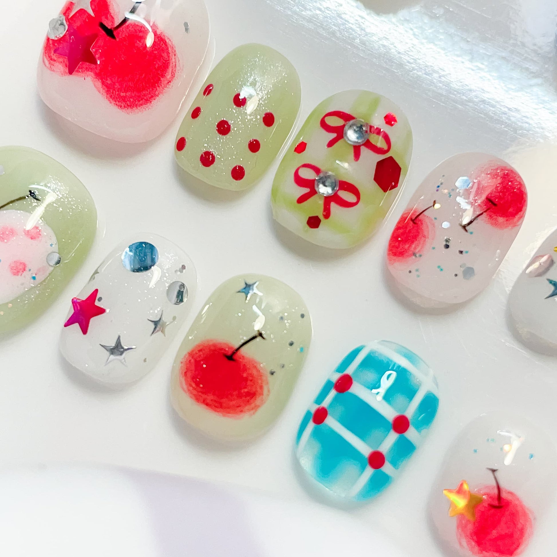 short length red oval press on nails with cherry design