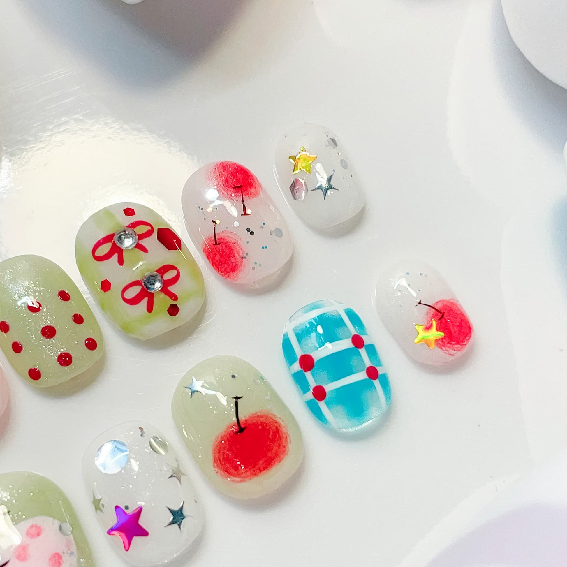 short length red oval press on nails with cherry design