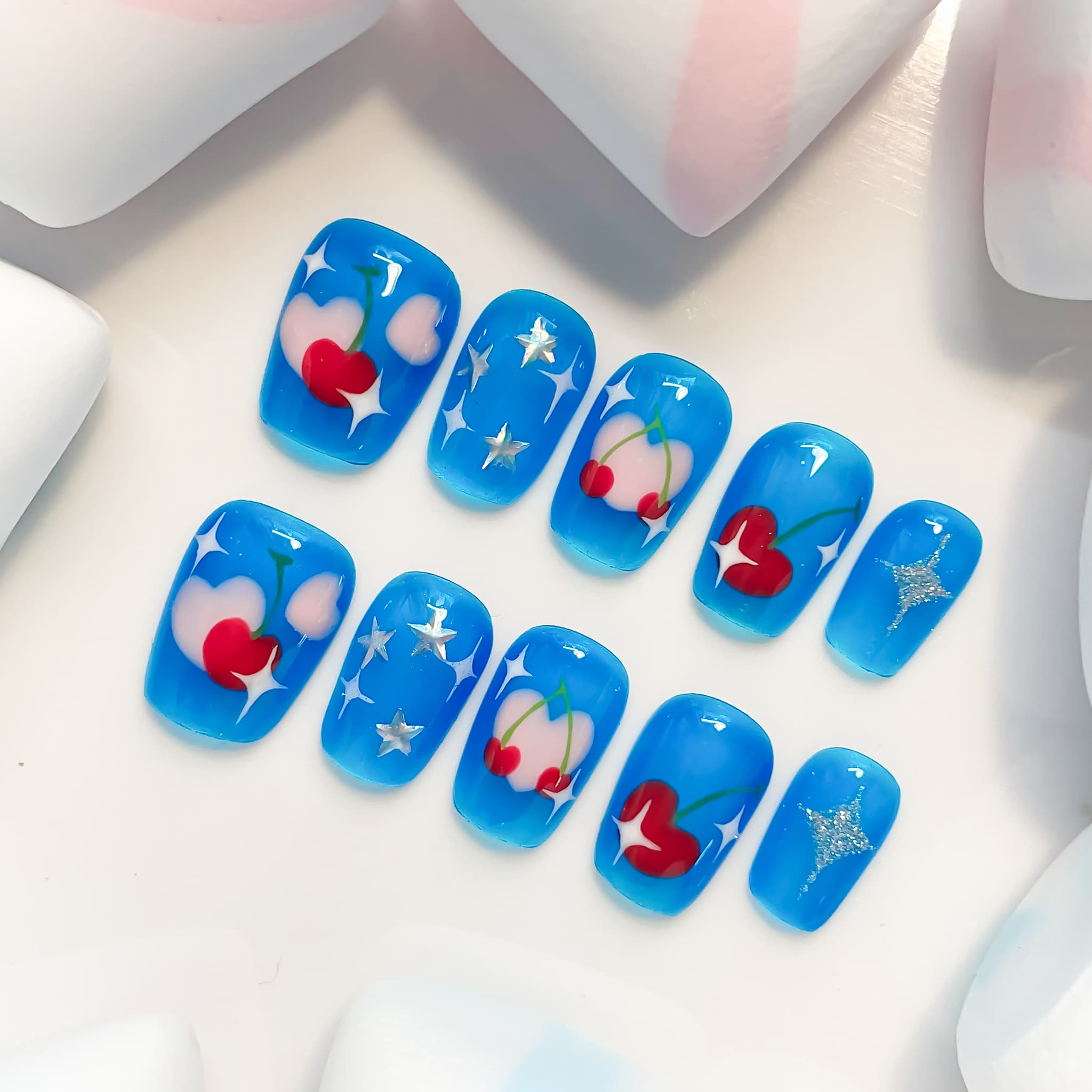 short length deep sky blue coffin press on nails with cherry and star designs