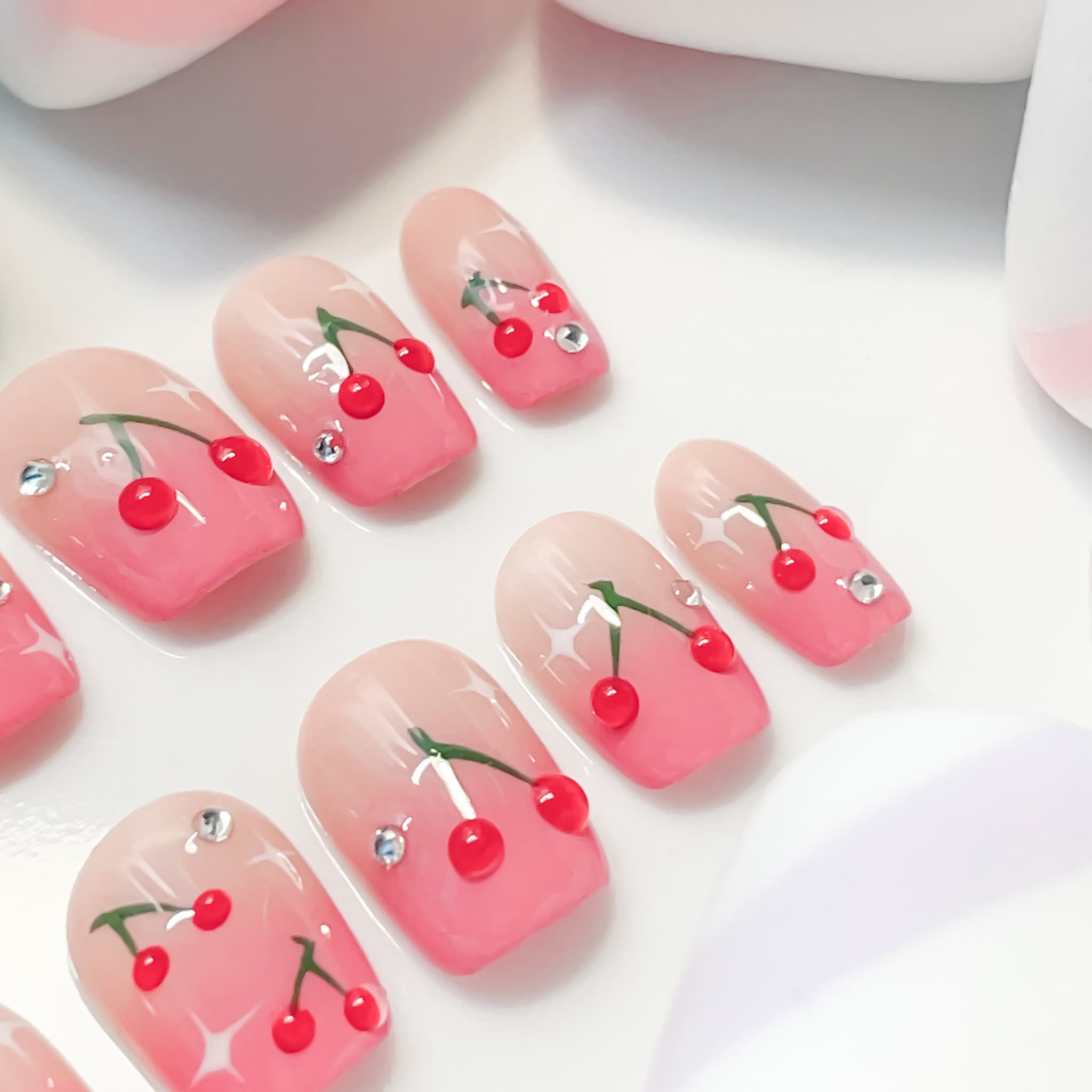 short length hot pink coffin press on nails with cherry designs