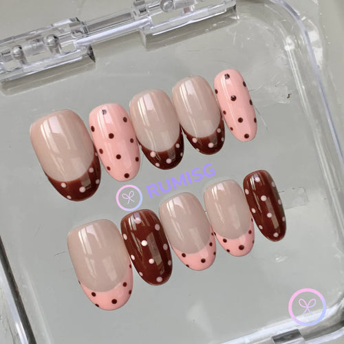  cute nude glossy short oval press on nails with polka dot and french tip
