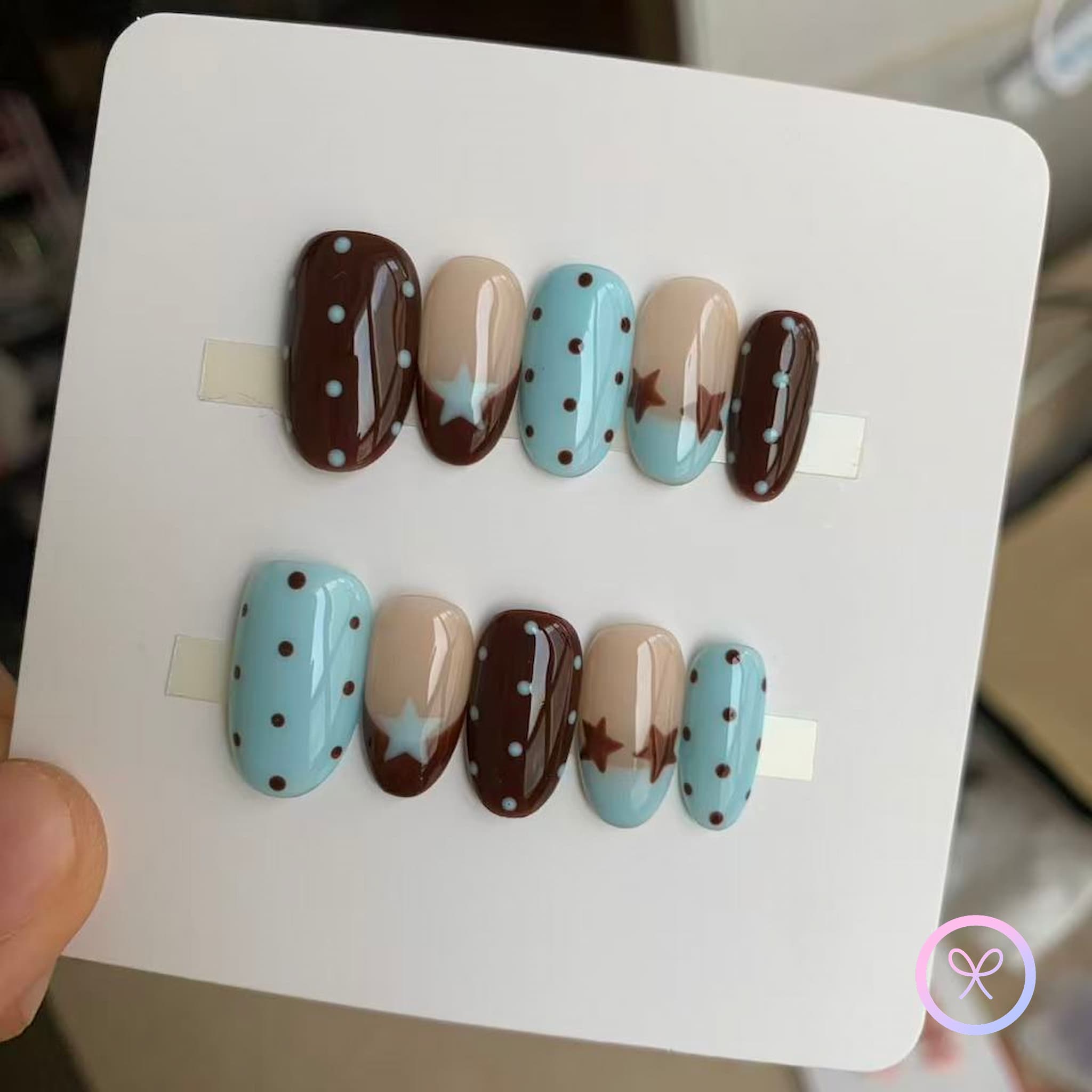 cute brown glossy short oval press on nails with polka dots and stars