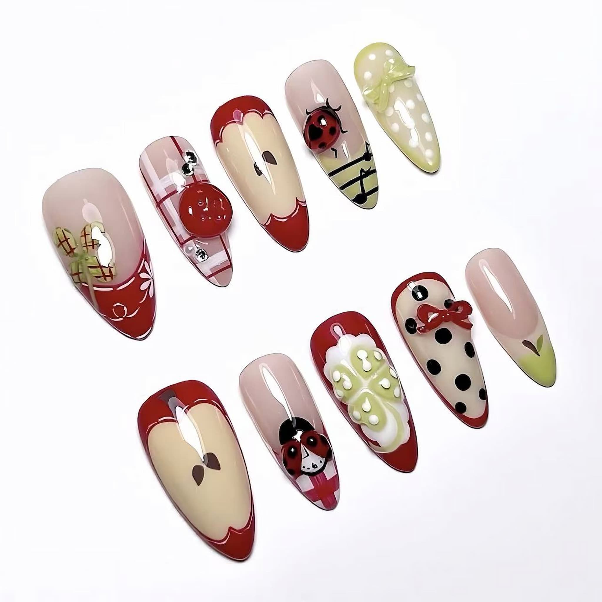medium length fire brick almond press on nails with ladybug , cotton and apple design