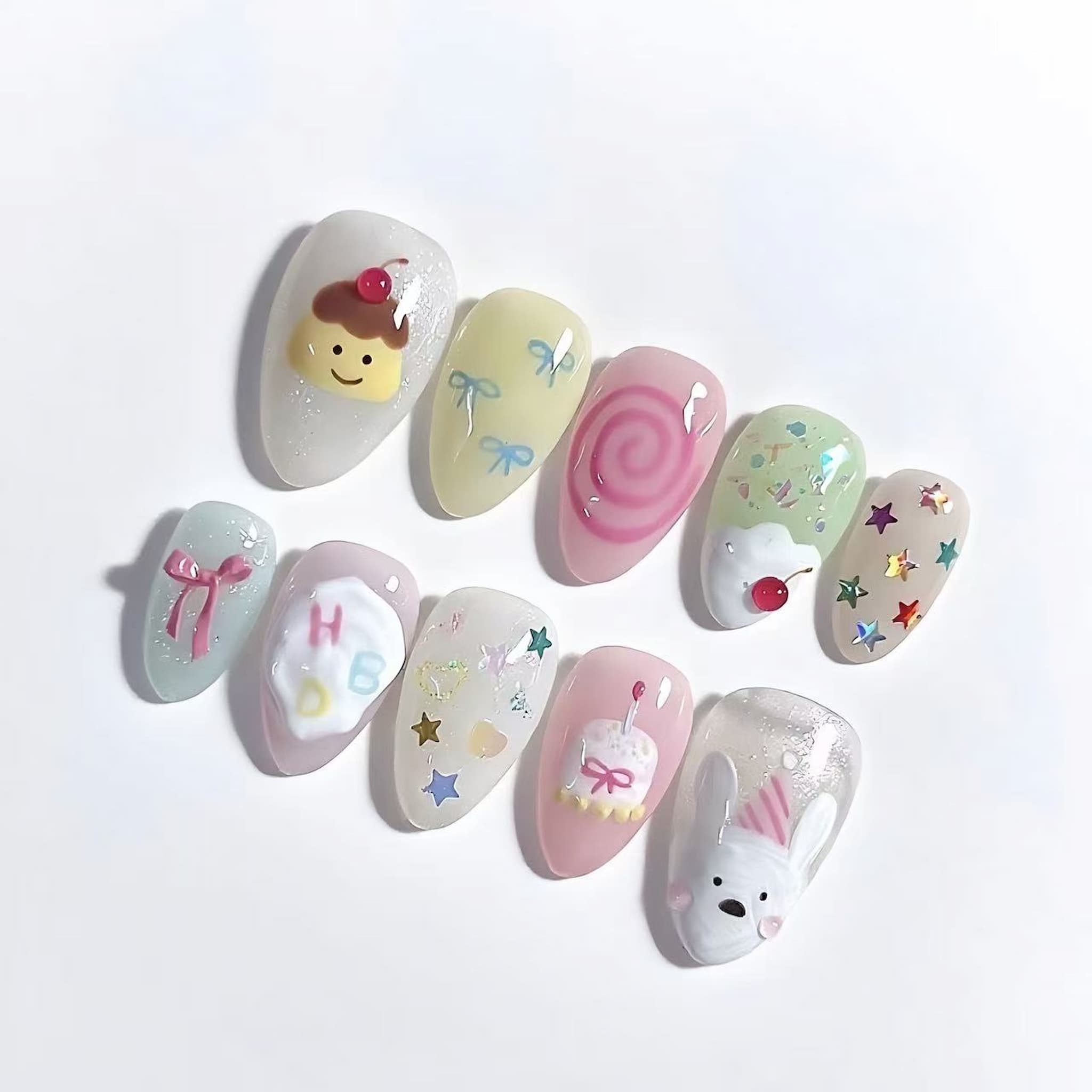 short length misty rose almond press on nails , cute pudding design