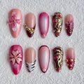 medium length crimson almond press on nails with gold beads and flowers